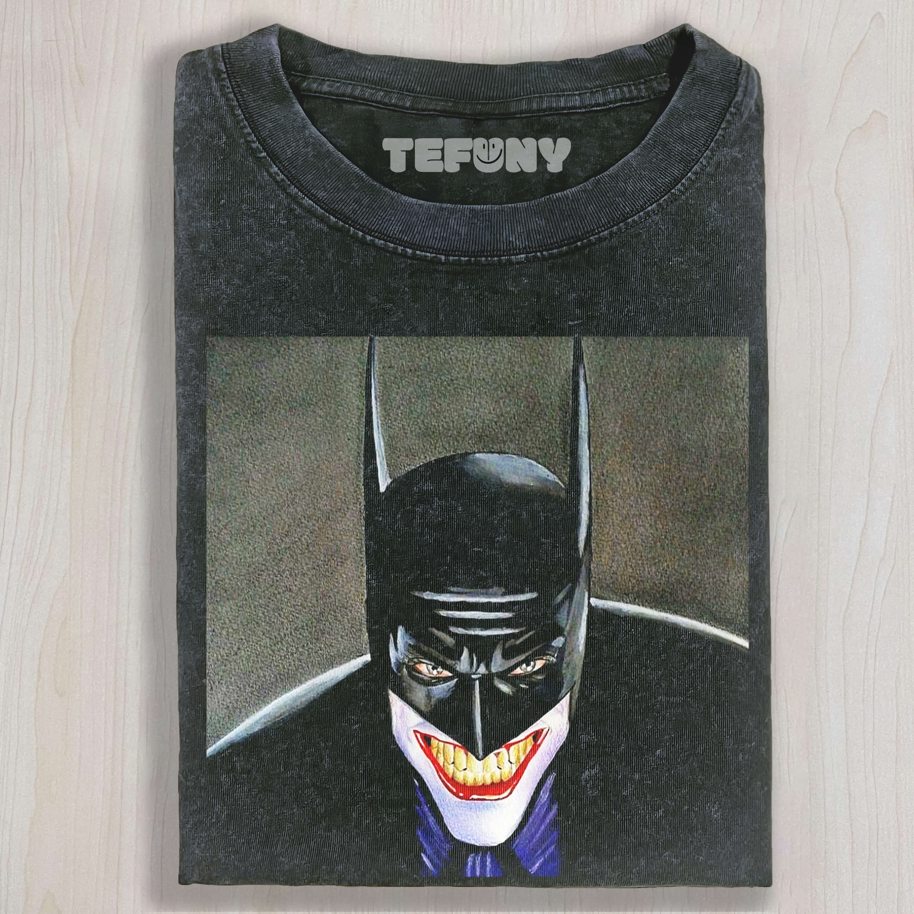 A COMBINATION OF BATMAN AND THE JOKER T-SHIRT