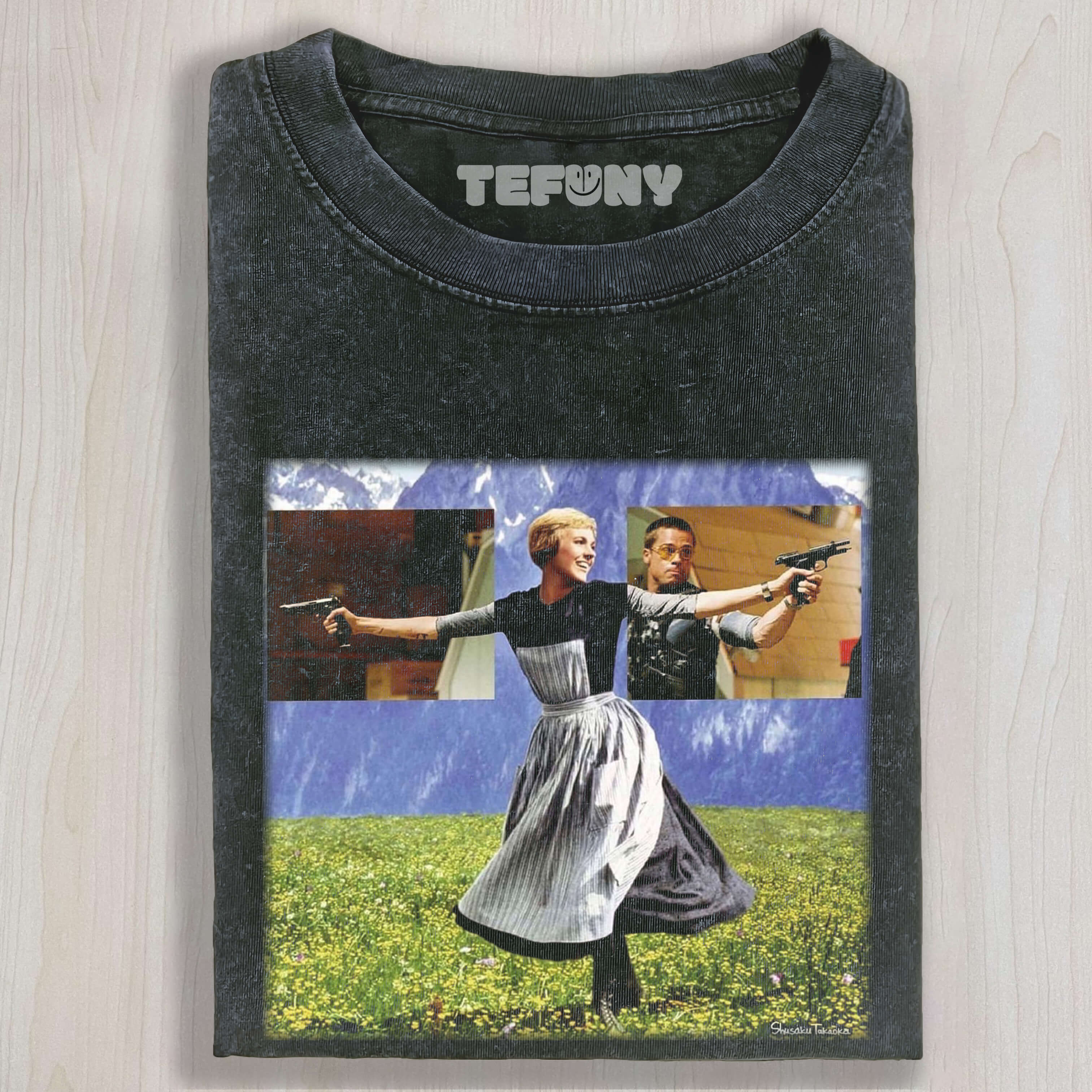 A WOMAN HOLDING TWO GUNS TEE & SWEAT & HOOD