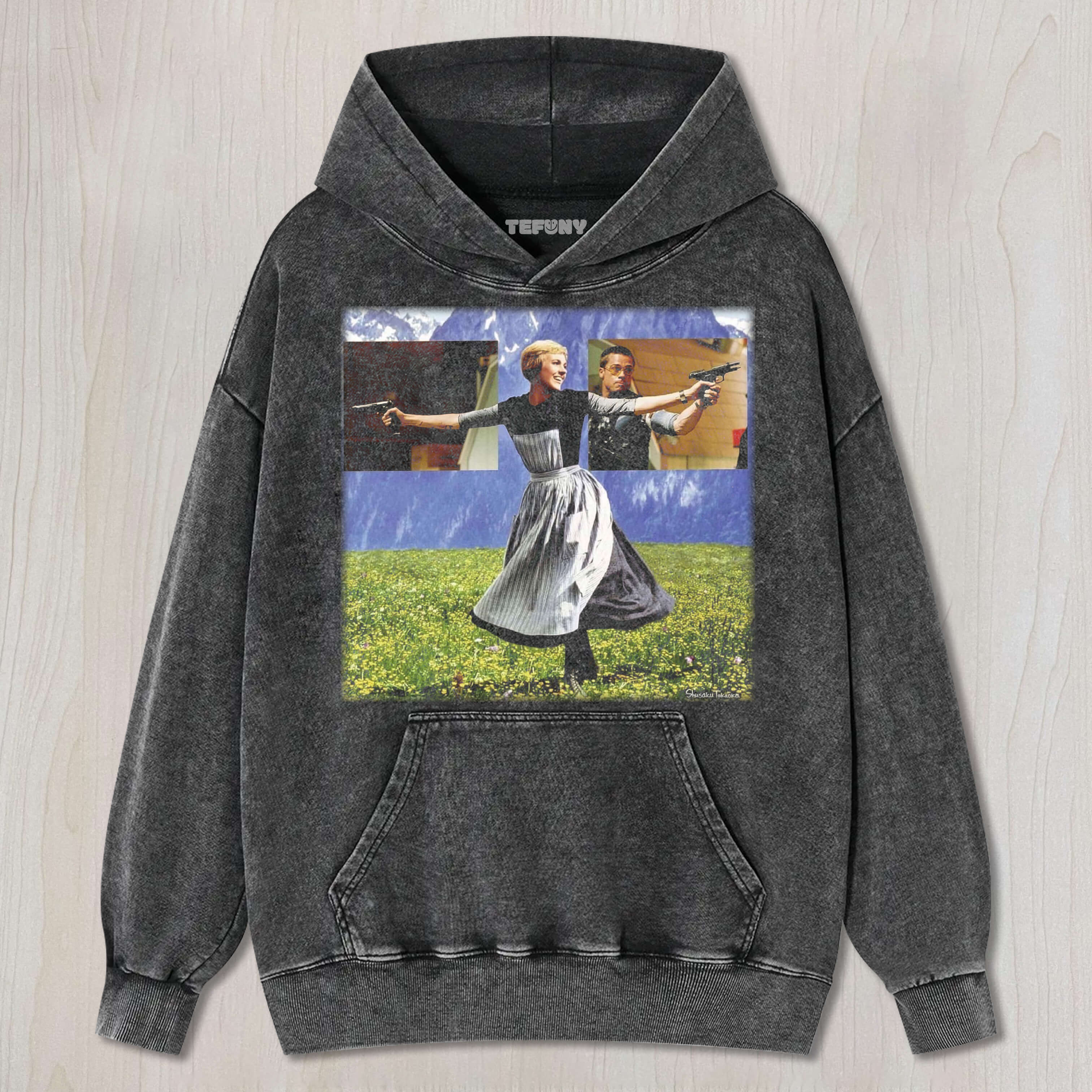 A WOMAN HOLDING TWO GUNS TEE & SWEAT & HOOD