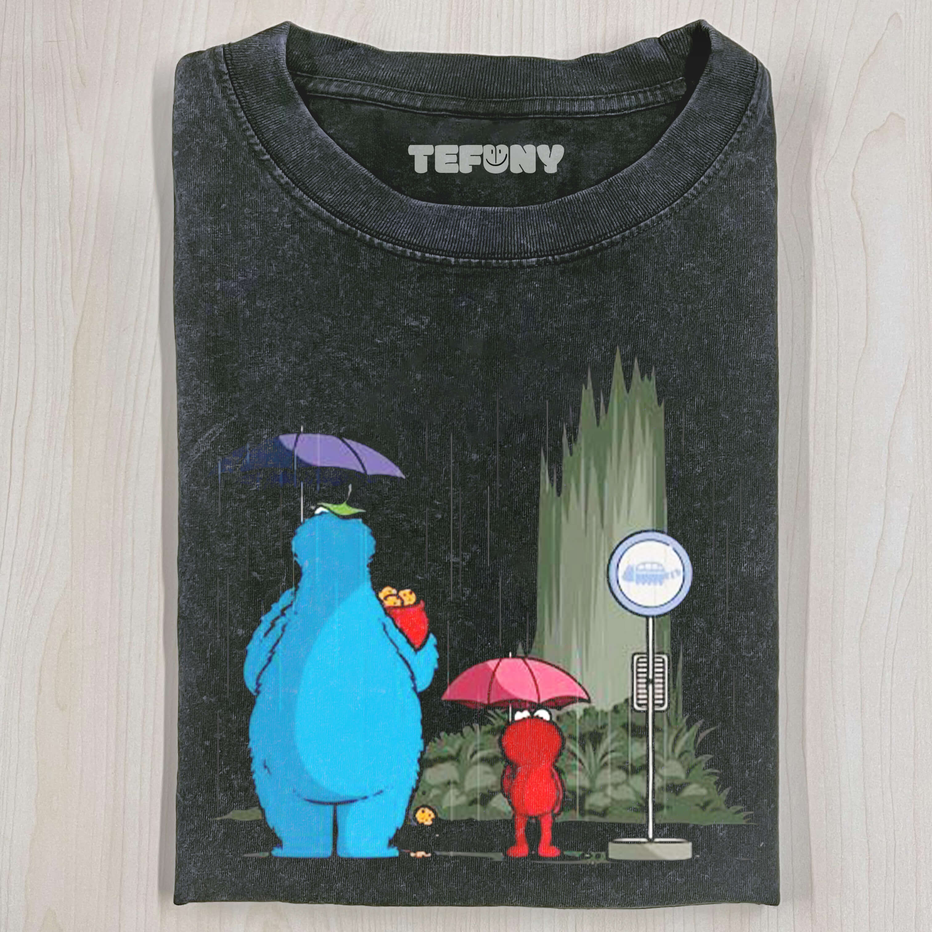 COOKIE MONSTER AND ELMO HOLDING UMBRELLAS IN THE RAIN T-SHIRT