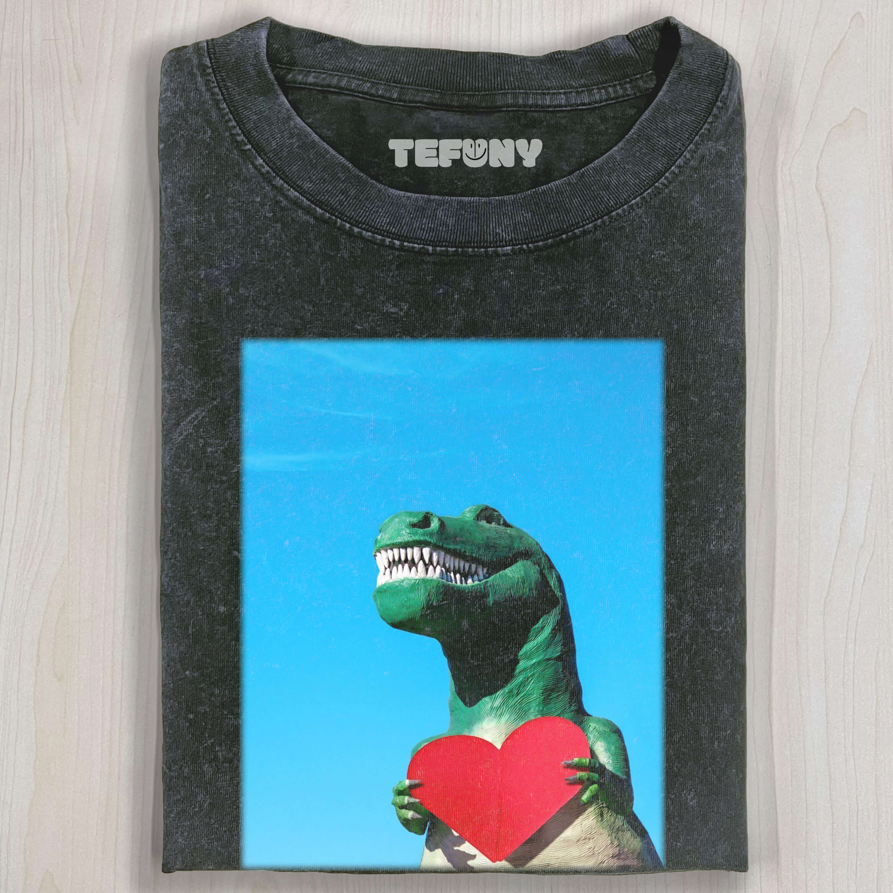 DINOSAUR MAKING A HEART T-SHIRT