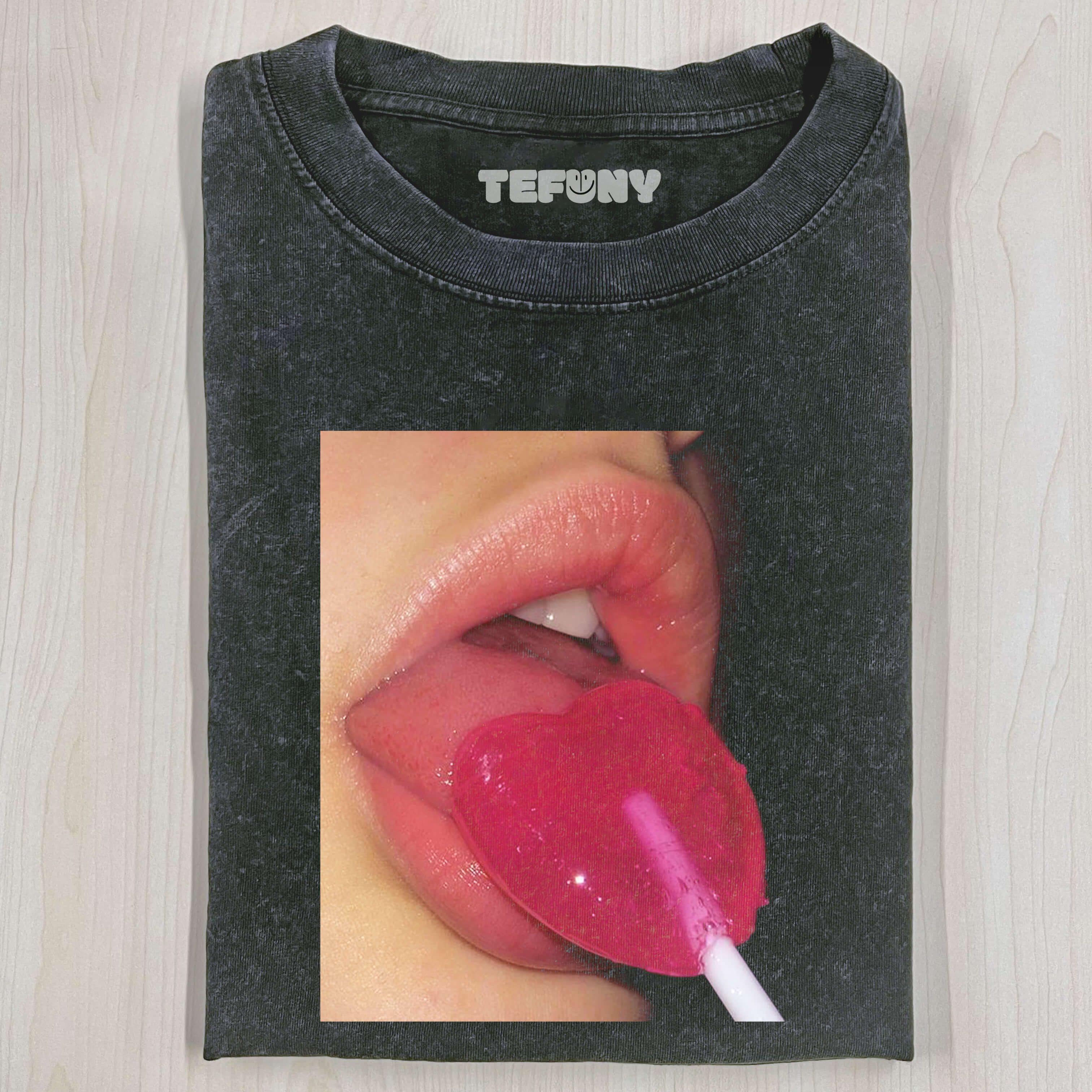 EATING A LOLLIPOP T-SHIRT
