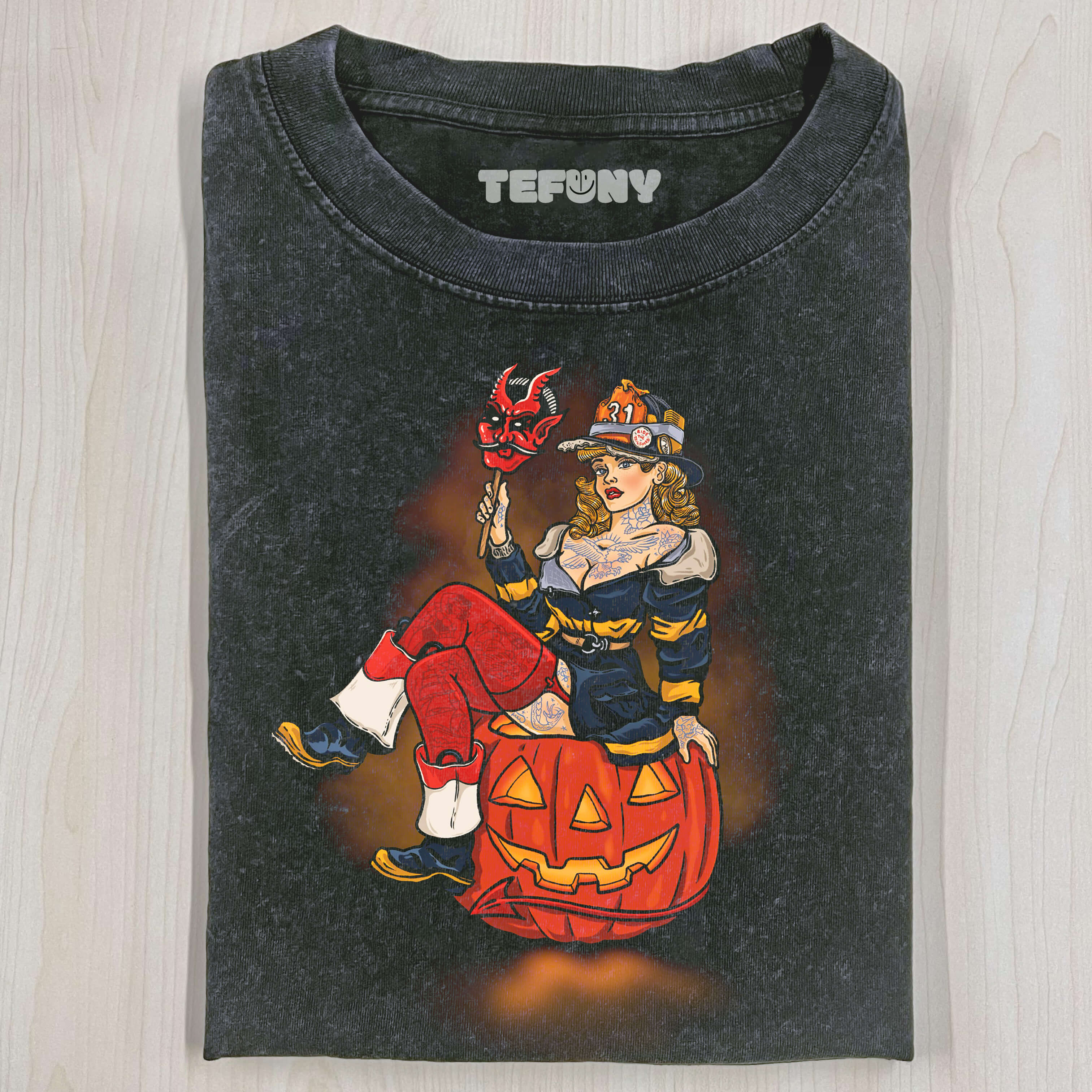 FEMALE FIREFIGHTER SITTING ON A PUMPKIN T-SHIRT
