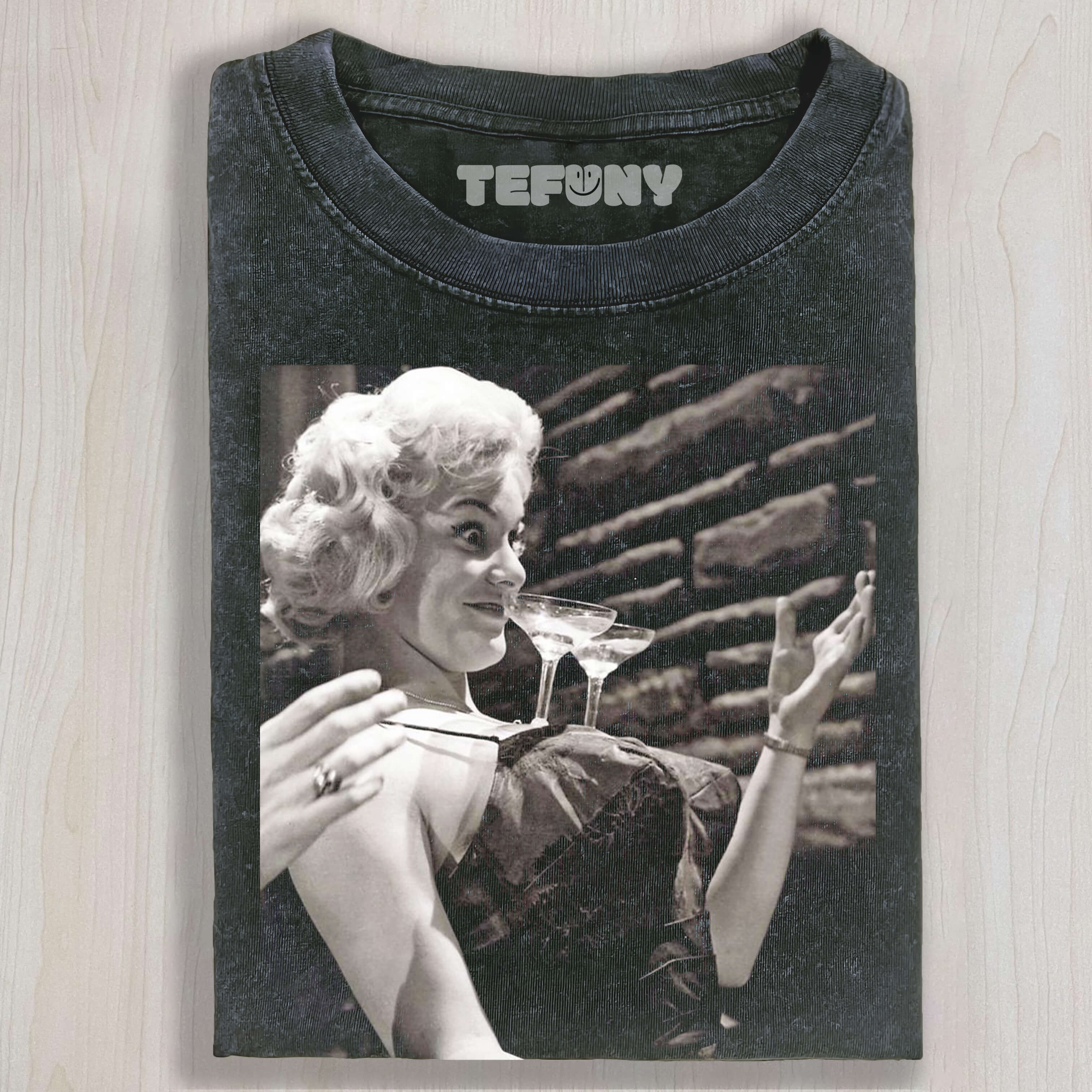 JOAN WILKINSON HAD TWO GLASSES OF WINE ON HER CHEST T-SHIRT