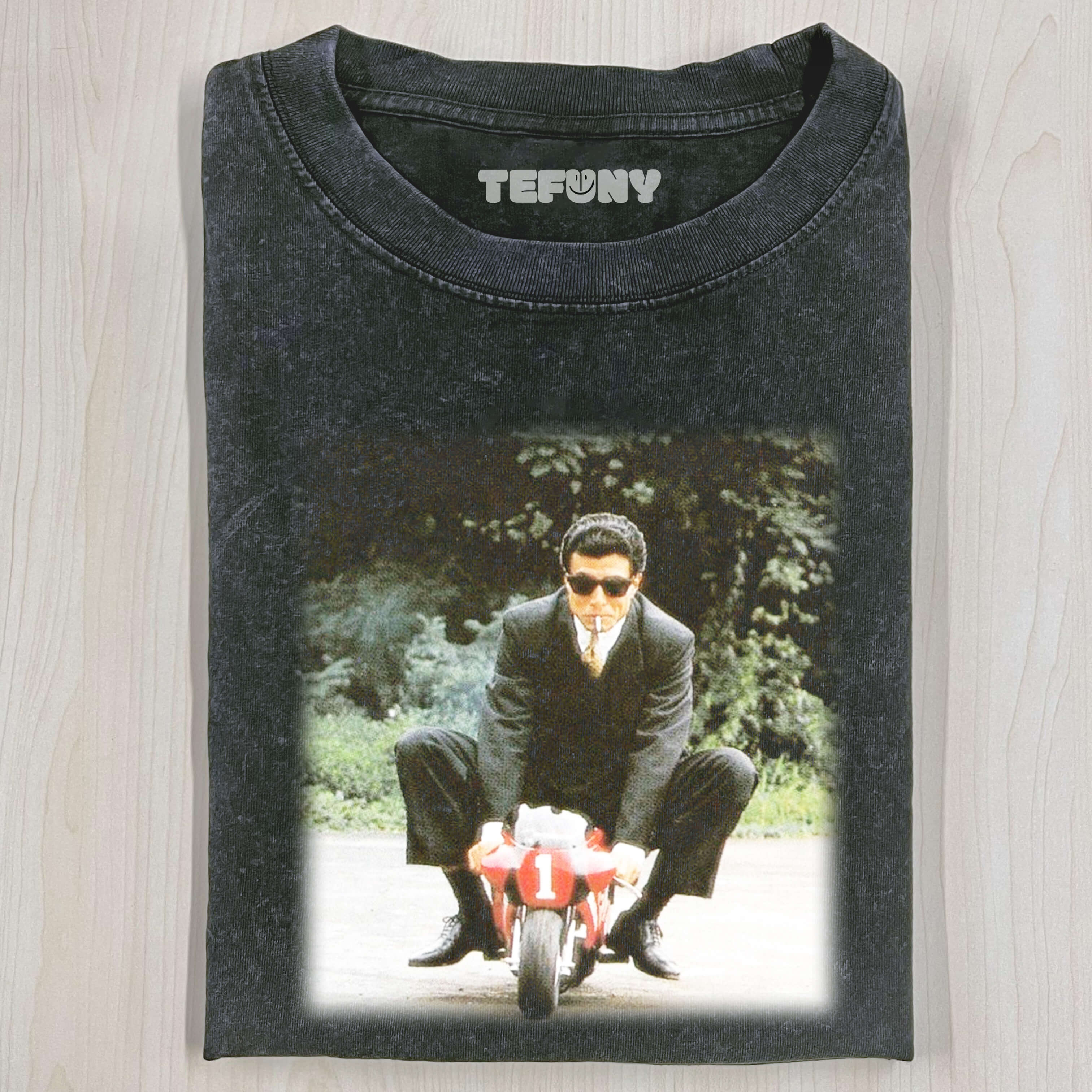 RIDING A MINI SCOOTER T-SHIRT