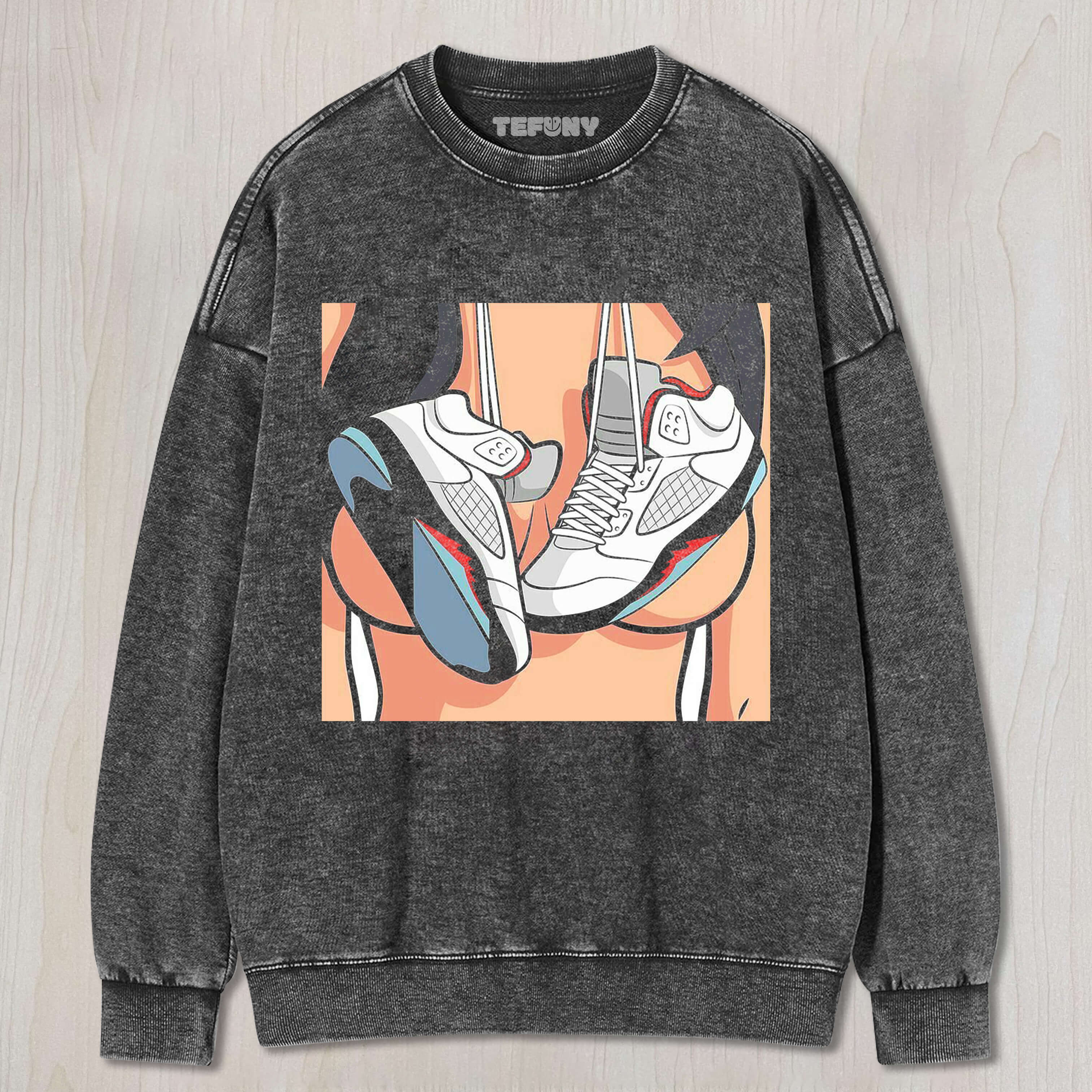 SHOES HANGING ON THE CHEST T-SHIRT