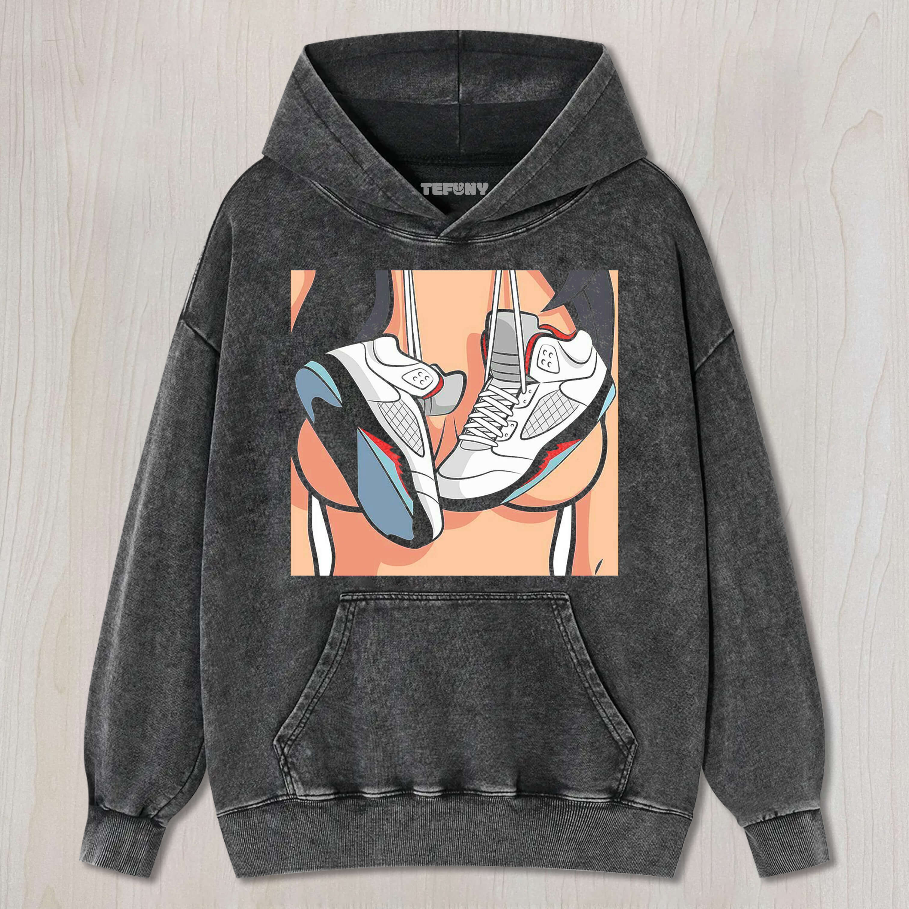 SHOES HANGING ON THE CHEST T-SHIRT