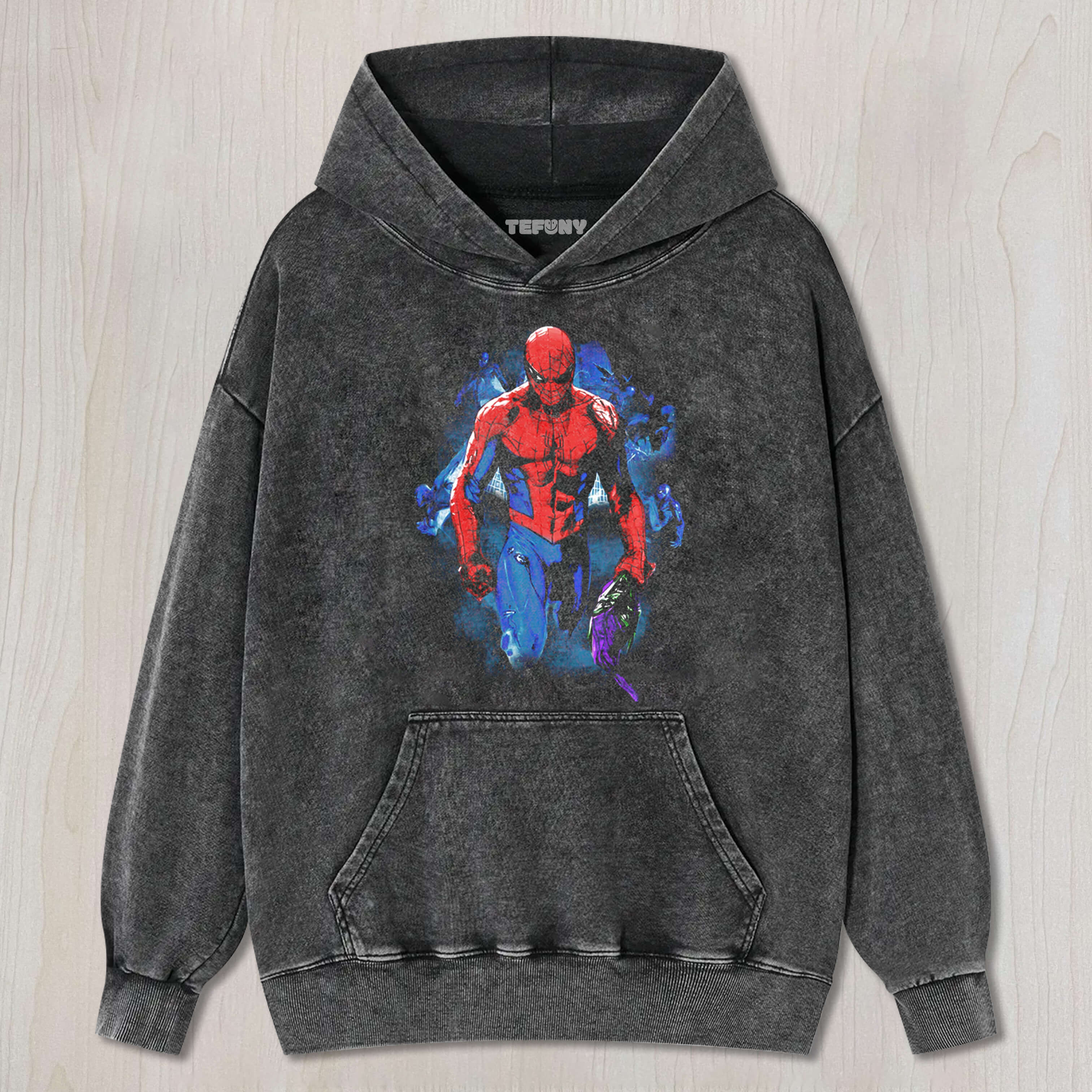 SPIDER-MAN IS HOLDING THE GREEN GOBLIN MASK TEE & SWEAT & HOOD