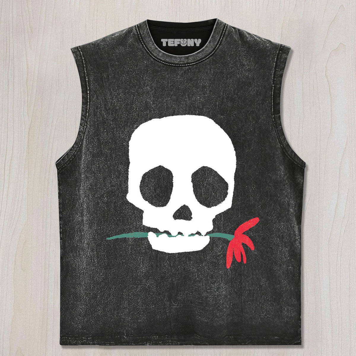 THE SKULL BITING A FLOWER UNISEX TEE, TANK TOP, LAYERED LS, SWEATSHIRT & HOODIE