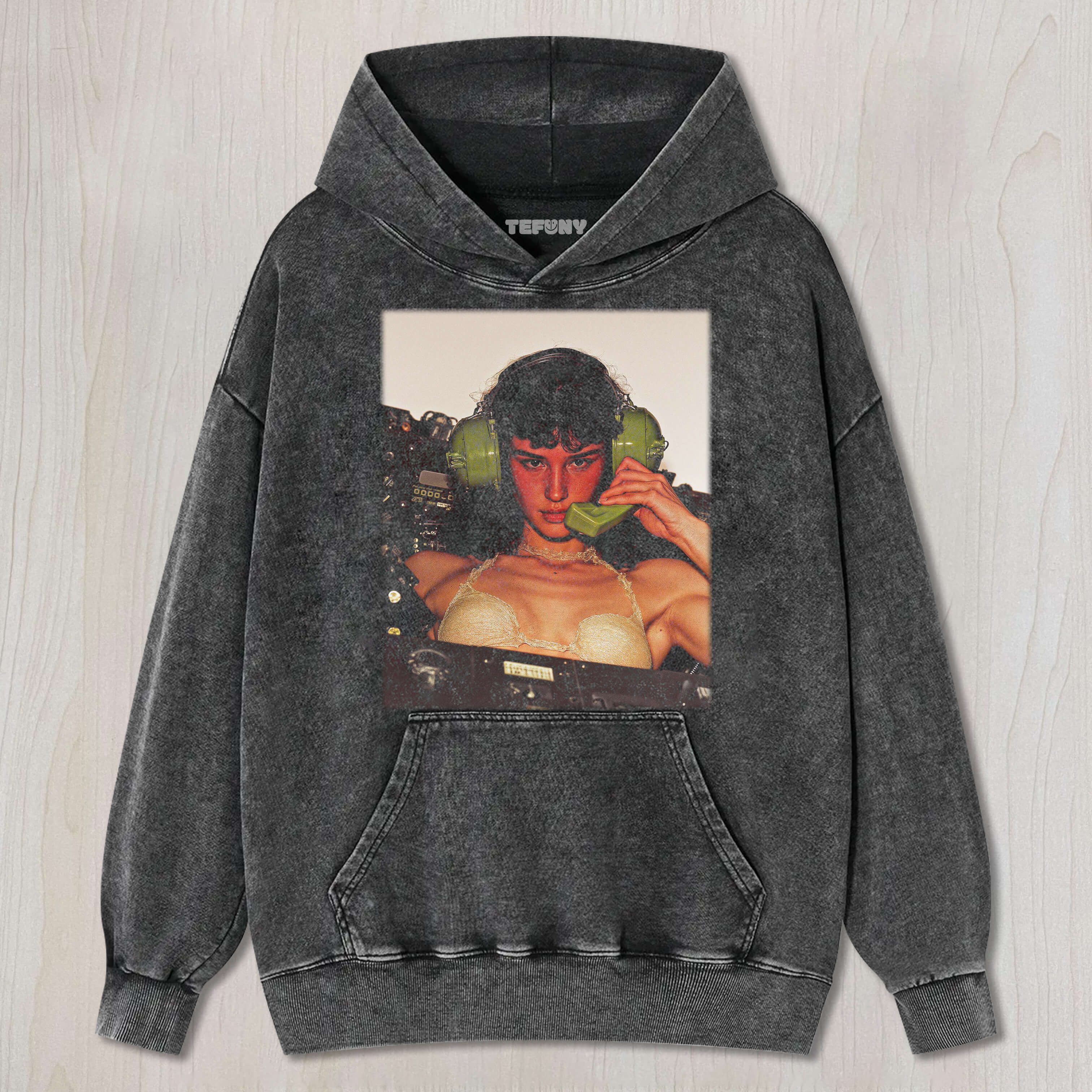 THE WOMAN IS HOLDING A GREEN PHONE TEE & SWEAT & HOOD