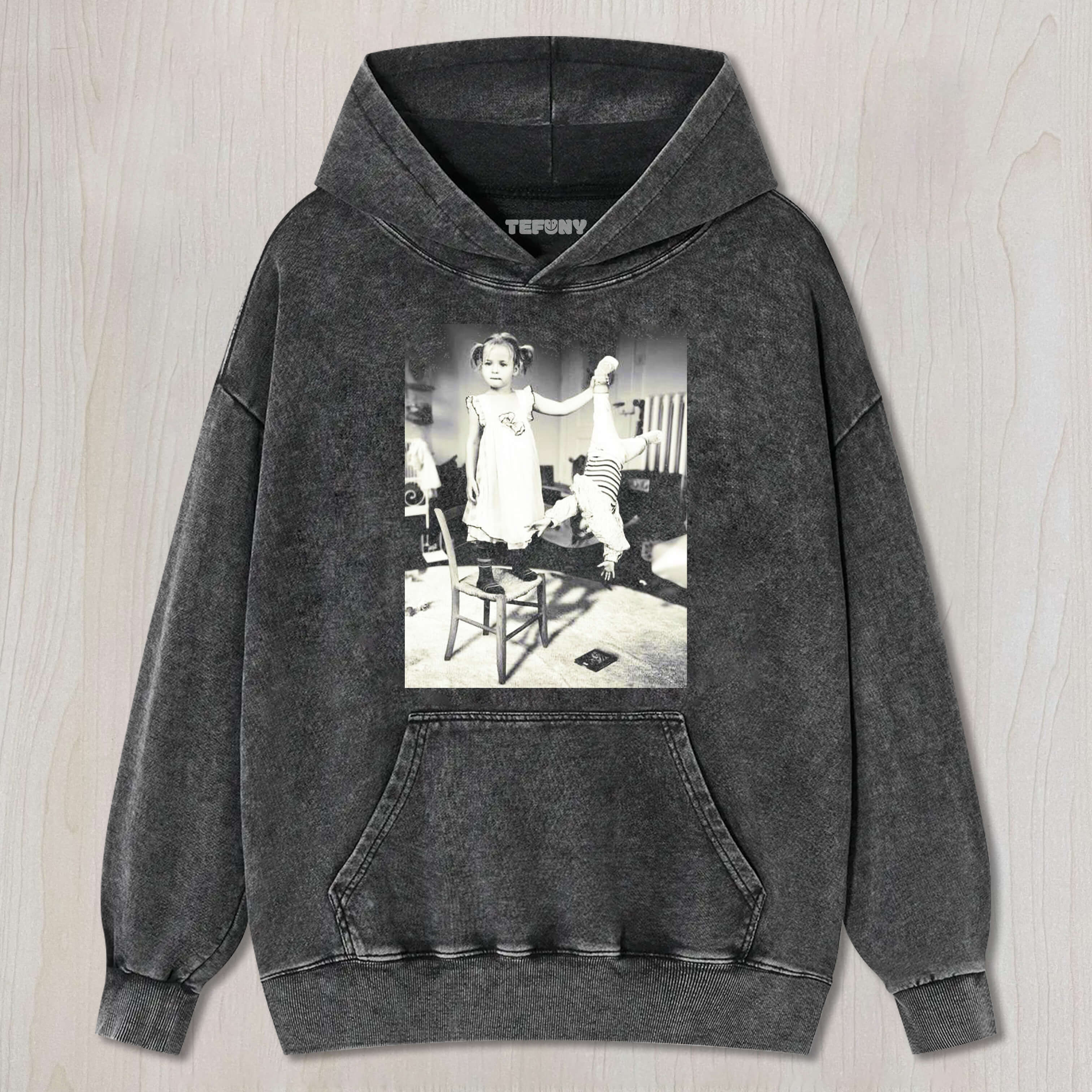 THE CHILD WAS HOLDING ONTO ANOTHER CHILD'S FOOT T-SHIRT & LONG SLEEVES & HOODIES