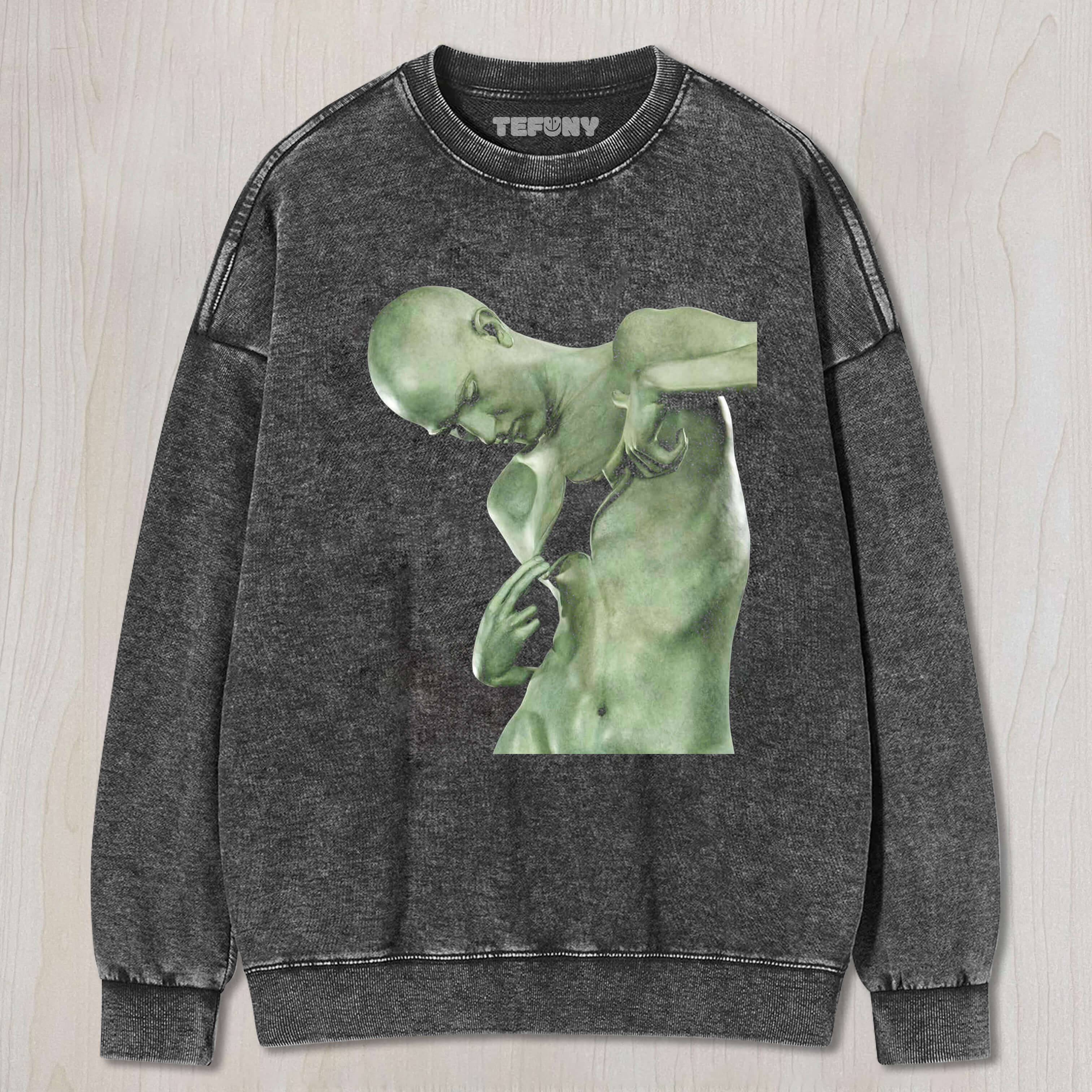 THE SCULPTURE HAS ITS CHEST TORN OPEN T-SHIRT & LONG SLEEVES & HOODIES