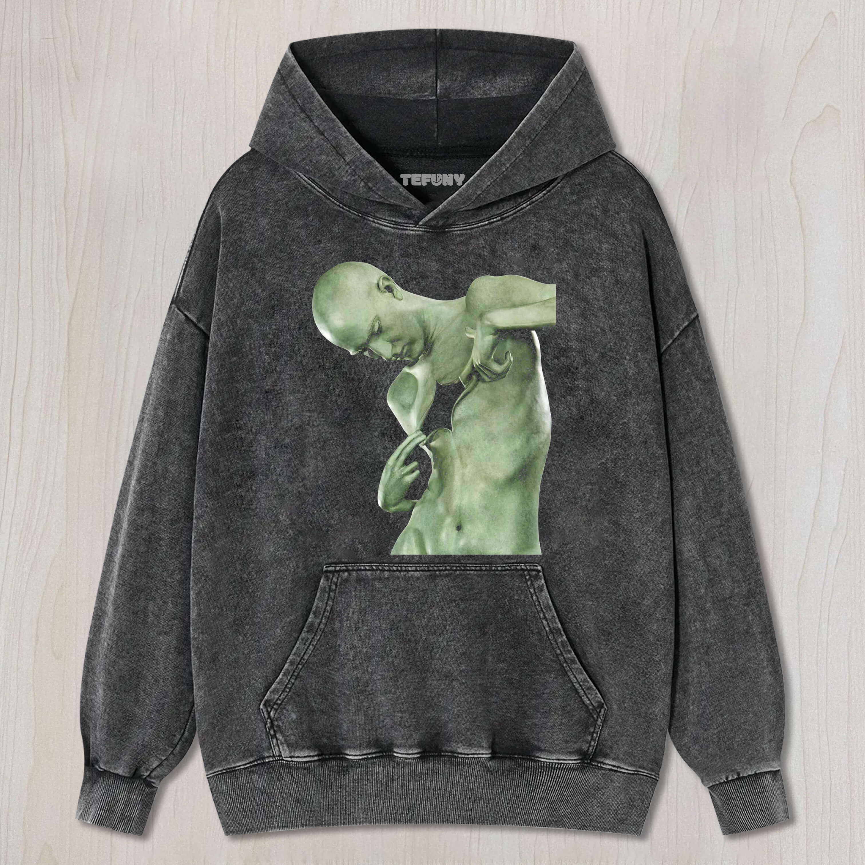 THE SCULPTURE HAS ITS CHEST TORN OPEN T-SHIRT & LONG SLEEVES & HOODIES