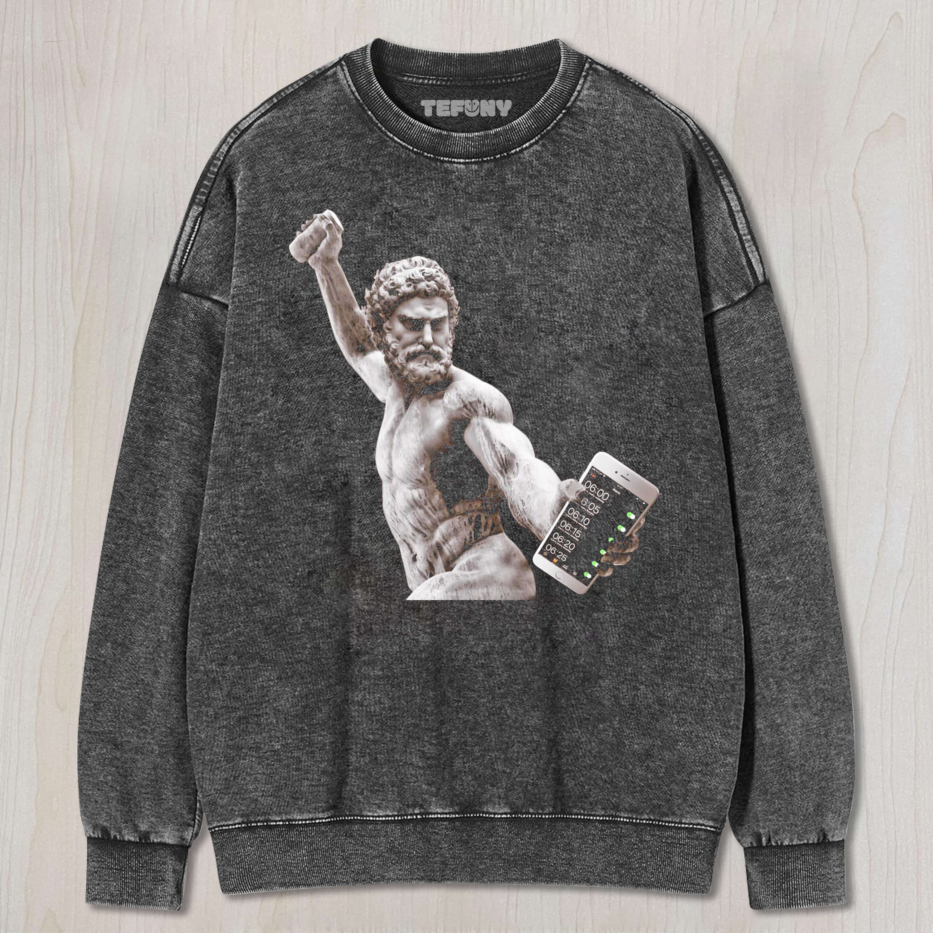 THE SCULPTURE IS HOLDING A CELL PHONE THAT'S A CLOCK T-SHIRT & LONG SLEEVES & HOODIES