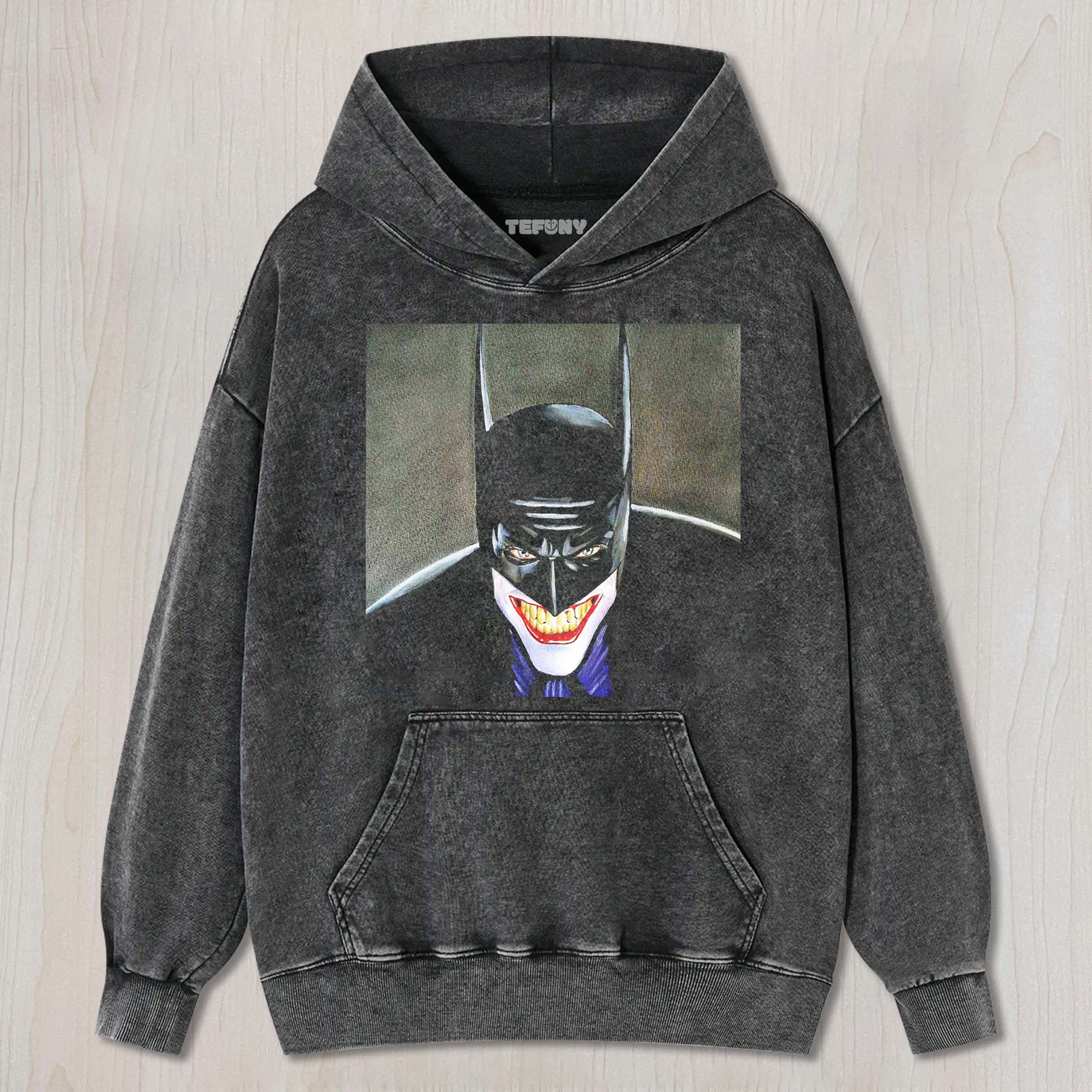 A COMBINATION OF BATMAN AND THE JOKER T-SHIRT