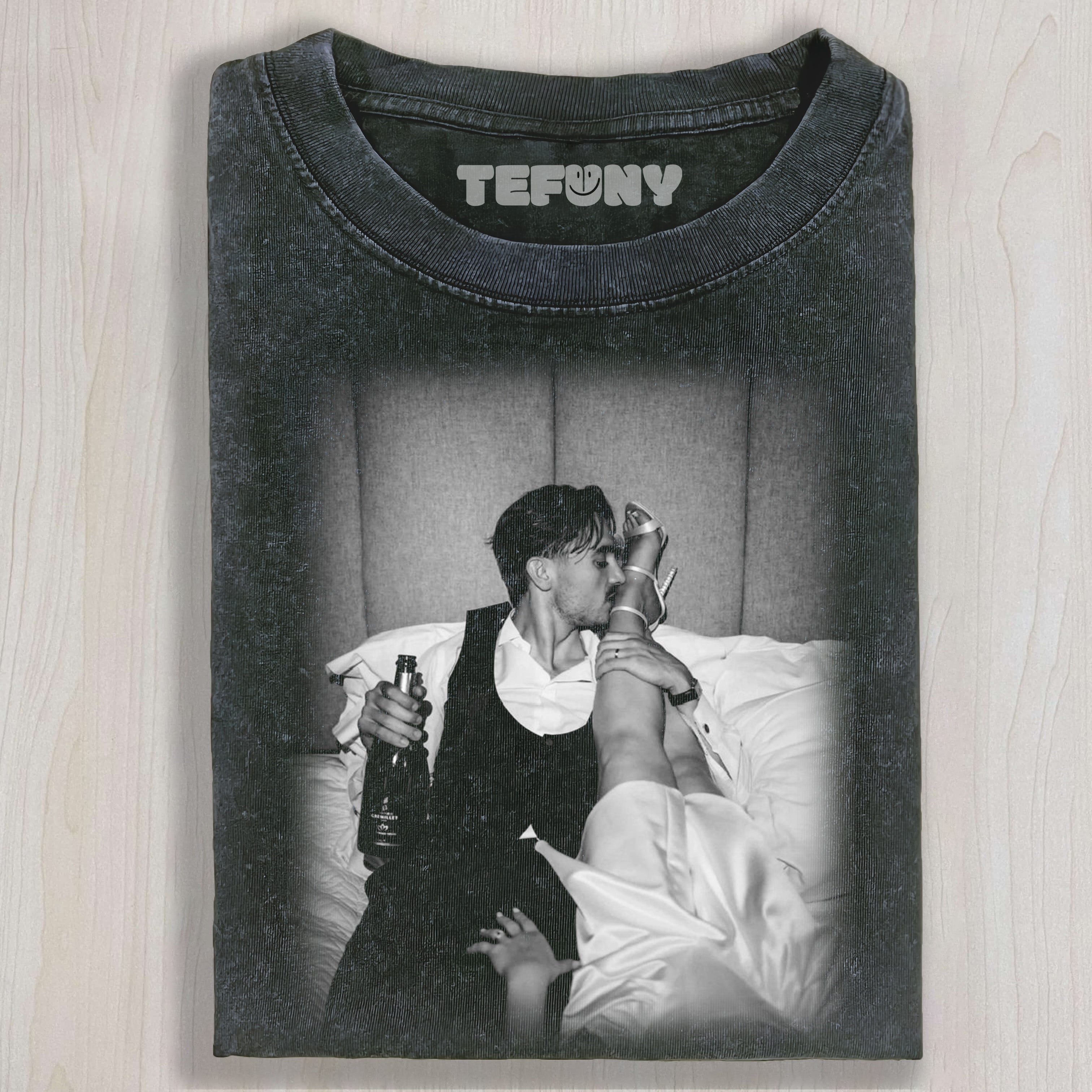 A MAN KISSES A WOMAN'S FEET T-SHIRT