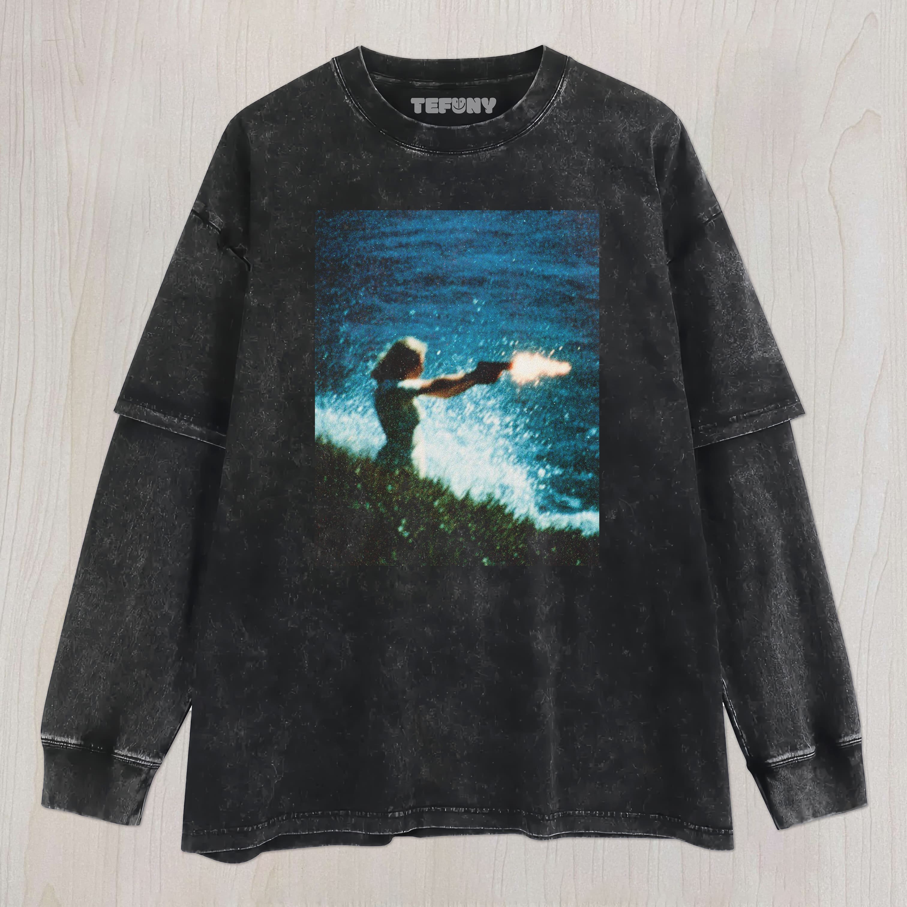 A WOMAN IS SHOOTING UNISEX TEE, TANK TOP, LAYERED LS, SWEATSHIRT & HOODIE