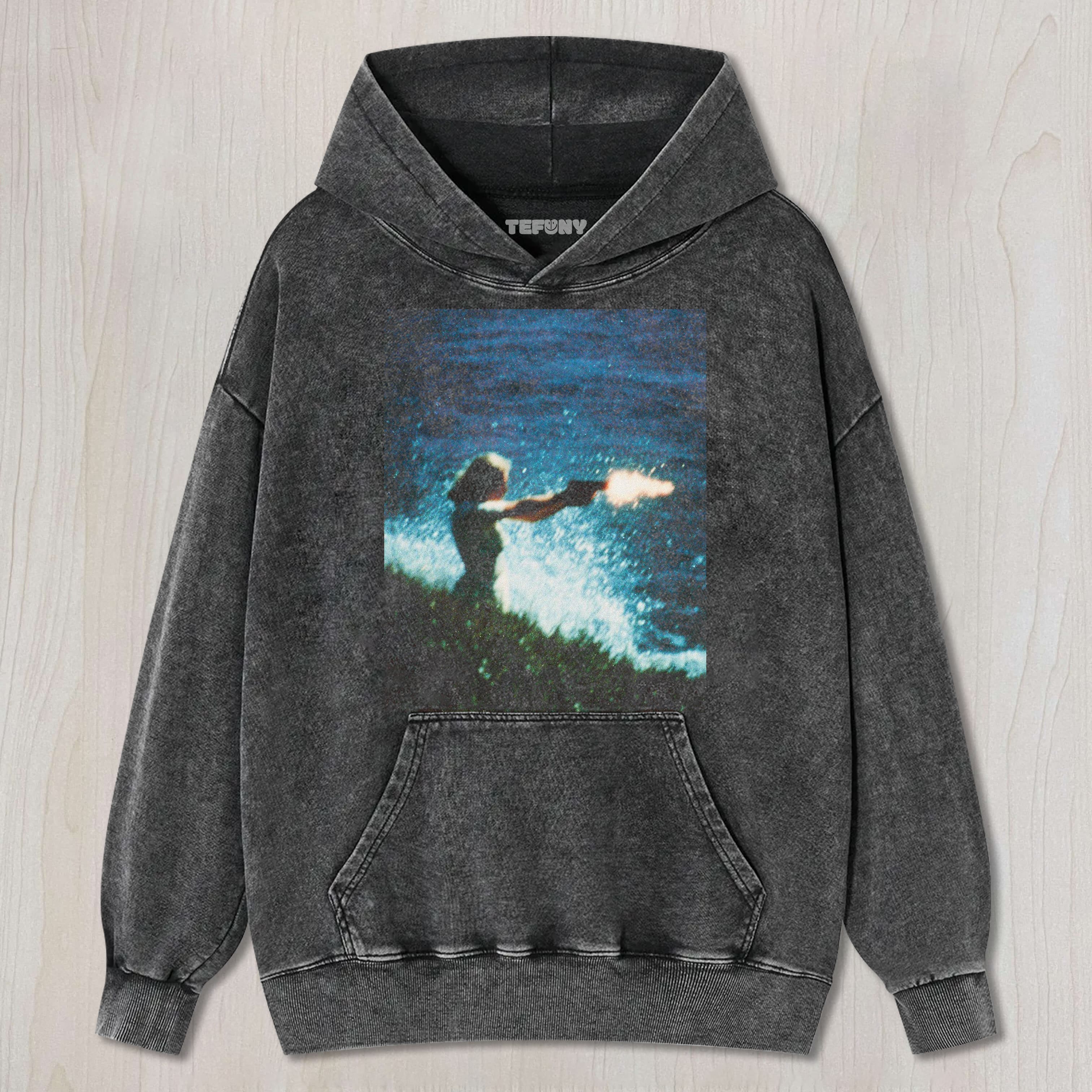 A WOMAN IS SHOOTING UNISEX TEE, TANK TOP, LAYERED LS, SWEATSHIRT & HOODIE