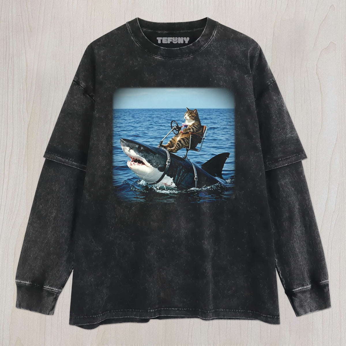 CAT RIDING A SHARK UNISEX TEE, TANK TOP, LAYERED LS, SWEATSHIRT & HOODIE