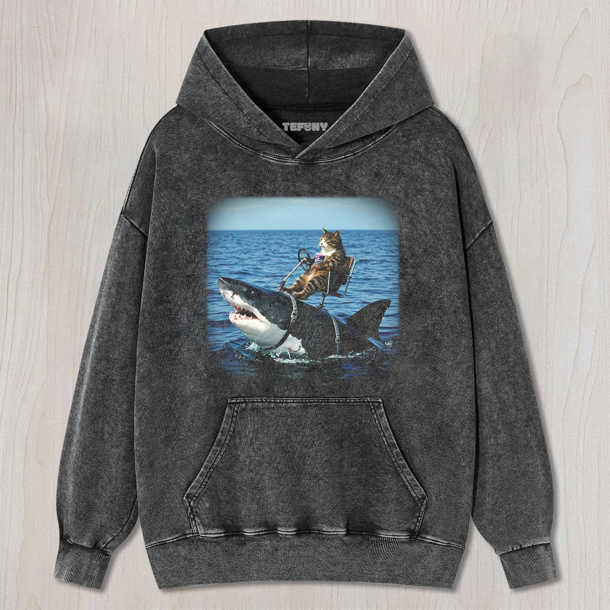 CAT RIDING A SHARK UNISEX TEE, TANK TOP, LAYERED LS, SWEATSHIRT & HOODIE