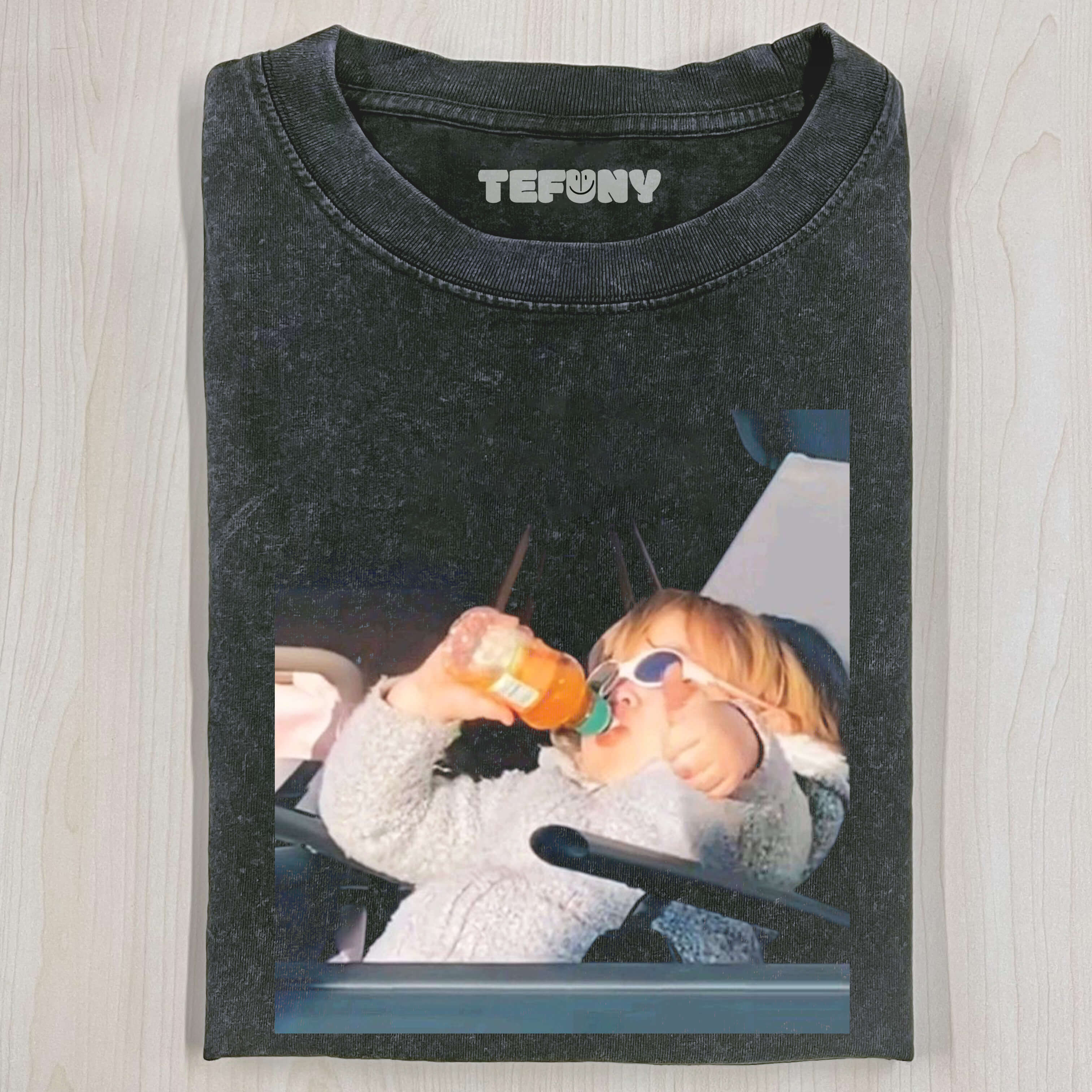 CHILD DRINKING A BEVERAGE T-SHIRT
