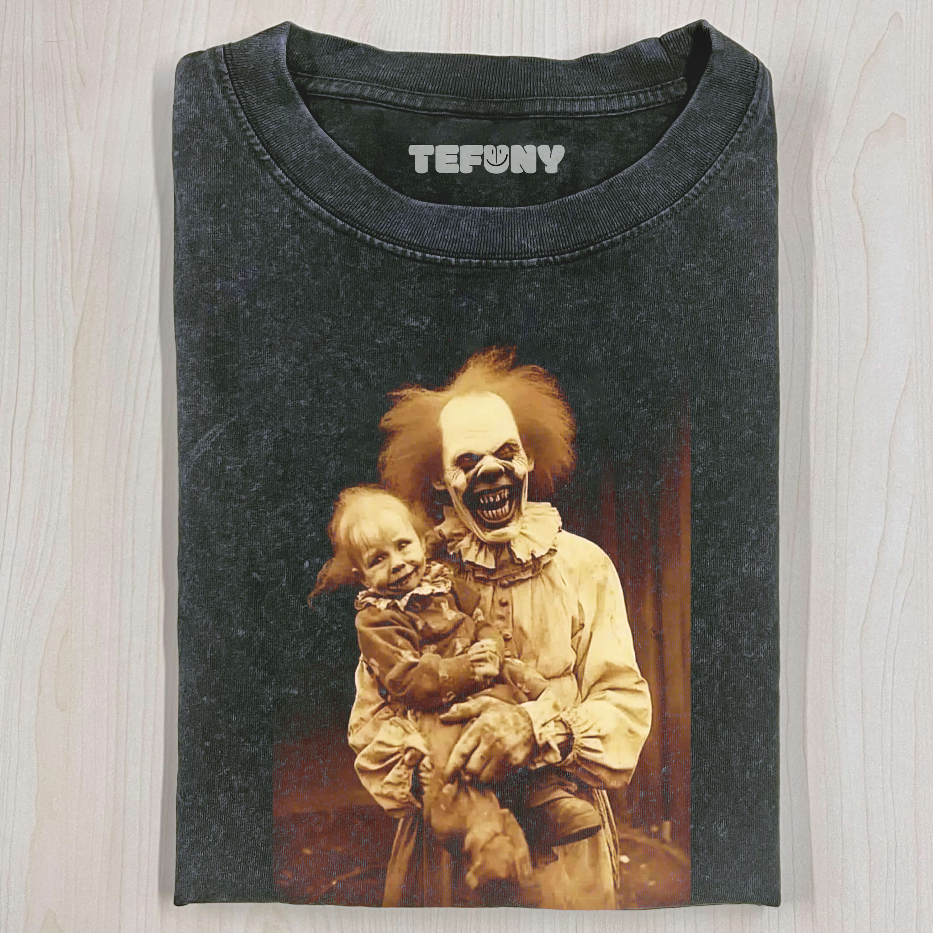CLOWN HOLDING CHILD T-SHIRT