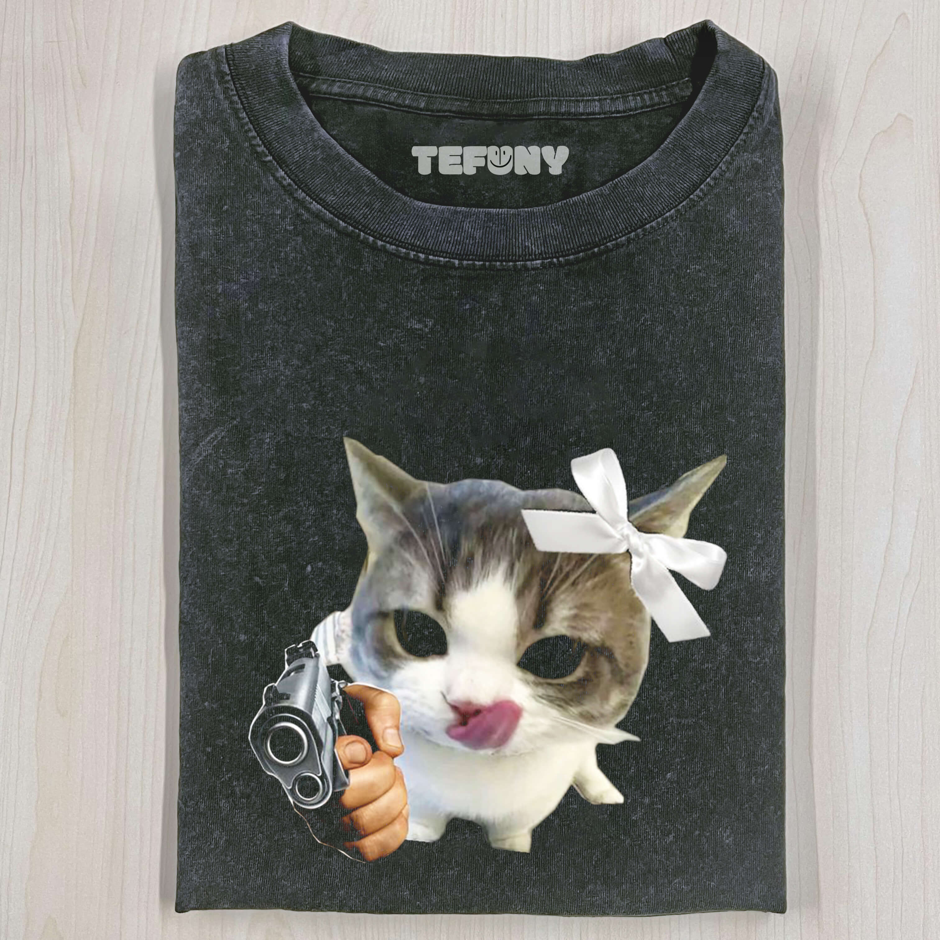 CUTE KITTEN HOLDING A GUN T-SHIRT
