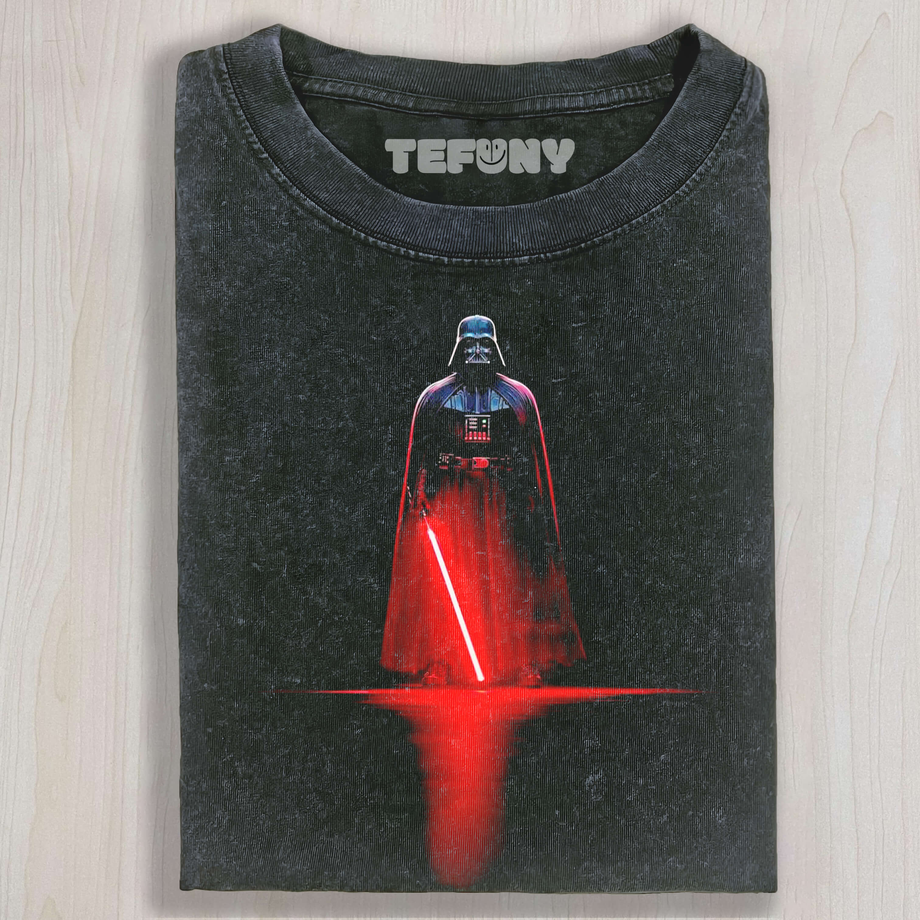 DARTH VADER WIELDING A GLOWING WEAPON T-SHIRT