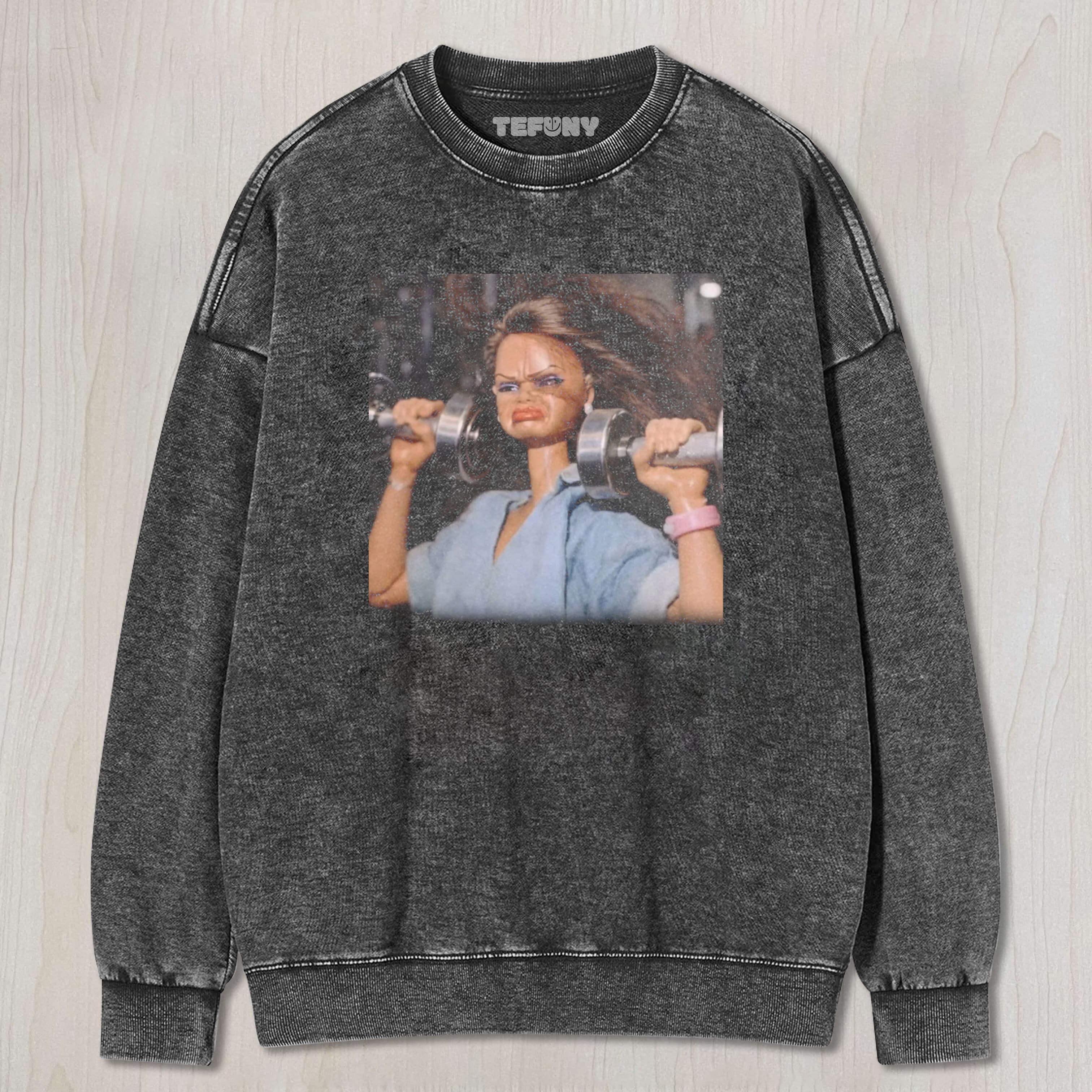DOLL FACE MEME SHE'S BUILT DIFFERENT UNISEX TEE, TANK TOP, LAYERED LS, SWEATSHIRT & HOODIE