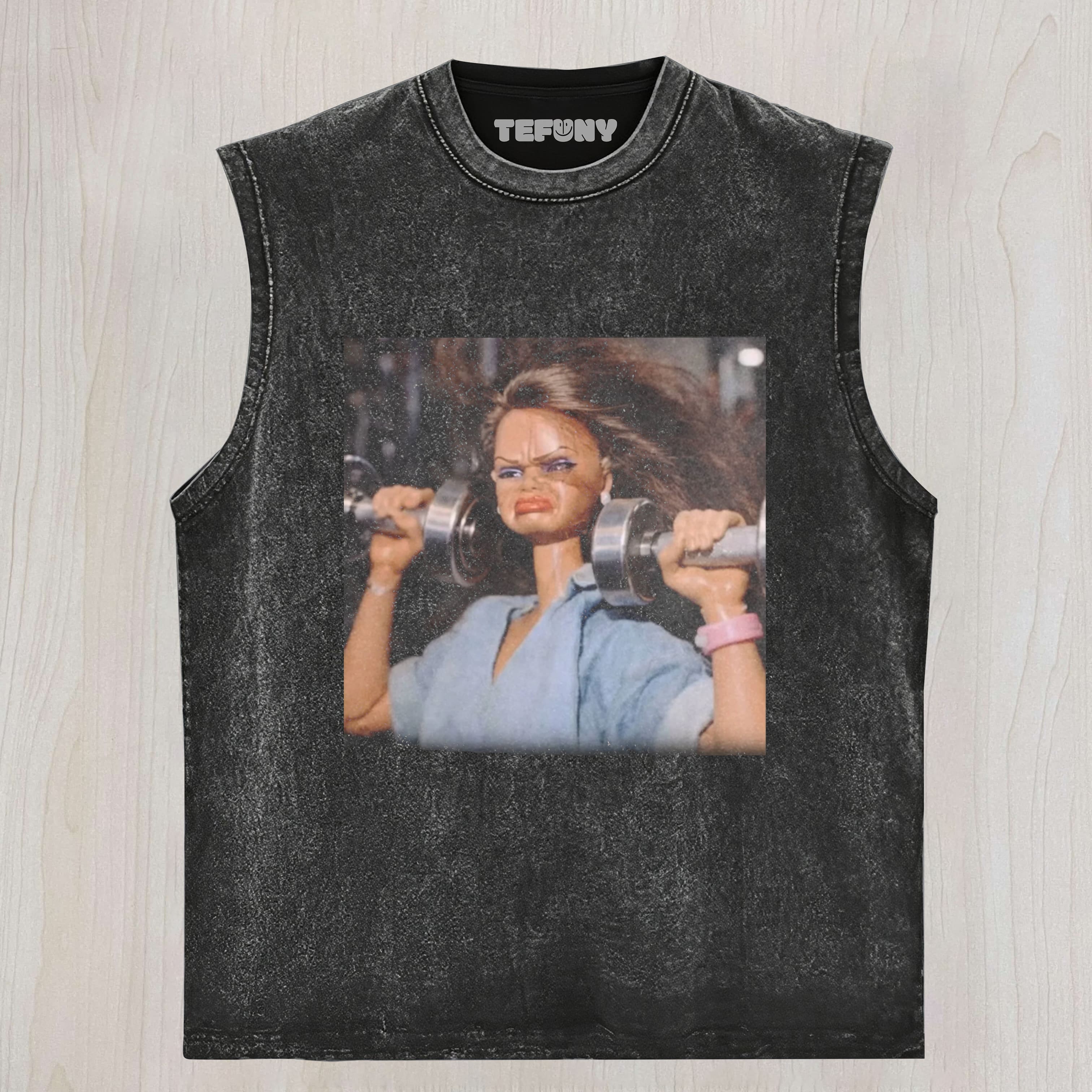 DOLL FACE MEME SHE'S BUILT DIFFERENT UNISEX TEE, TANK TOP, LAYERED LS, SWEATSHIRT & HOODIE
