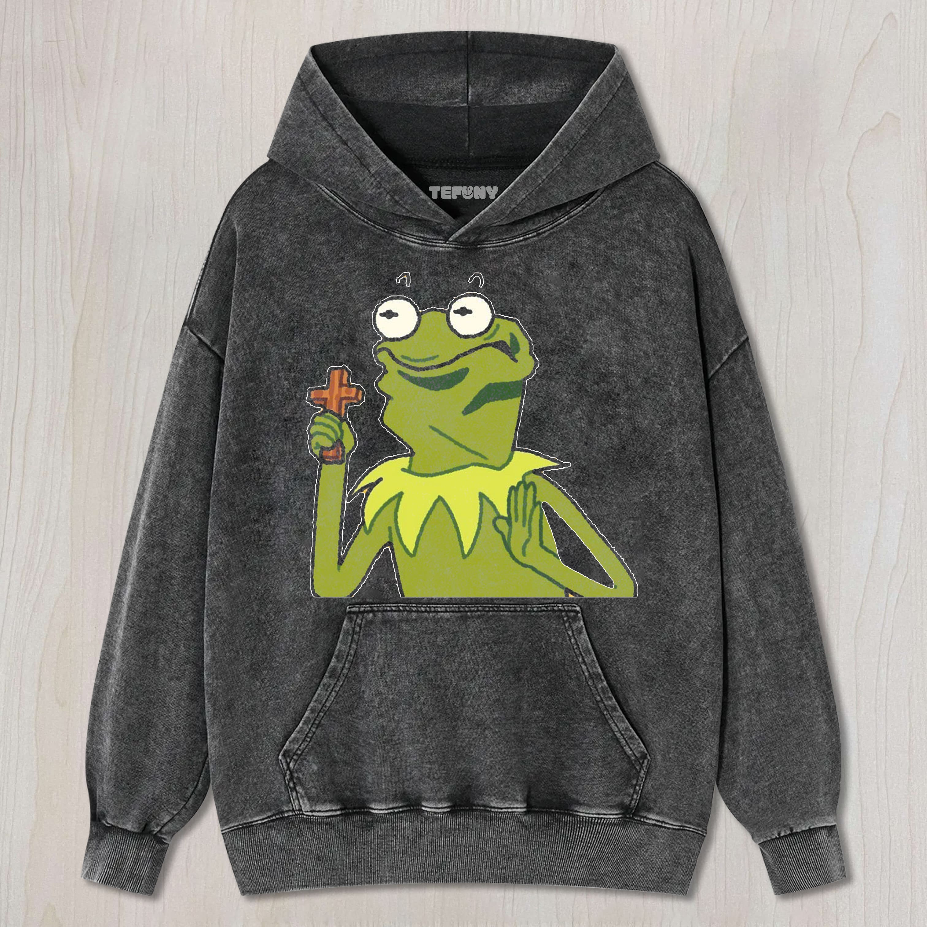 FROG HOLDING A CROSS UNISEX TEE, TANK TOP, LAYERED LS, SWEATSHIRT & HOODIE