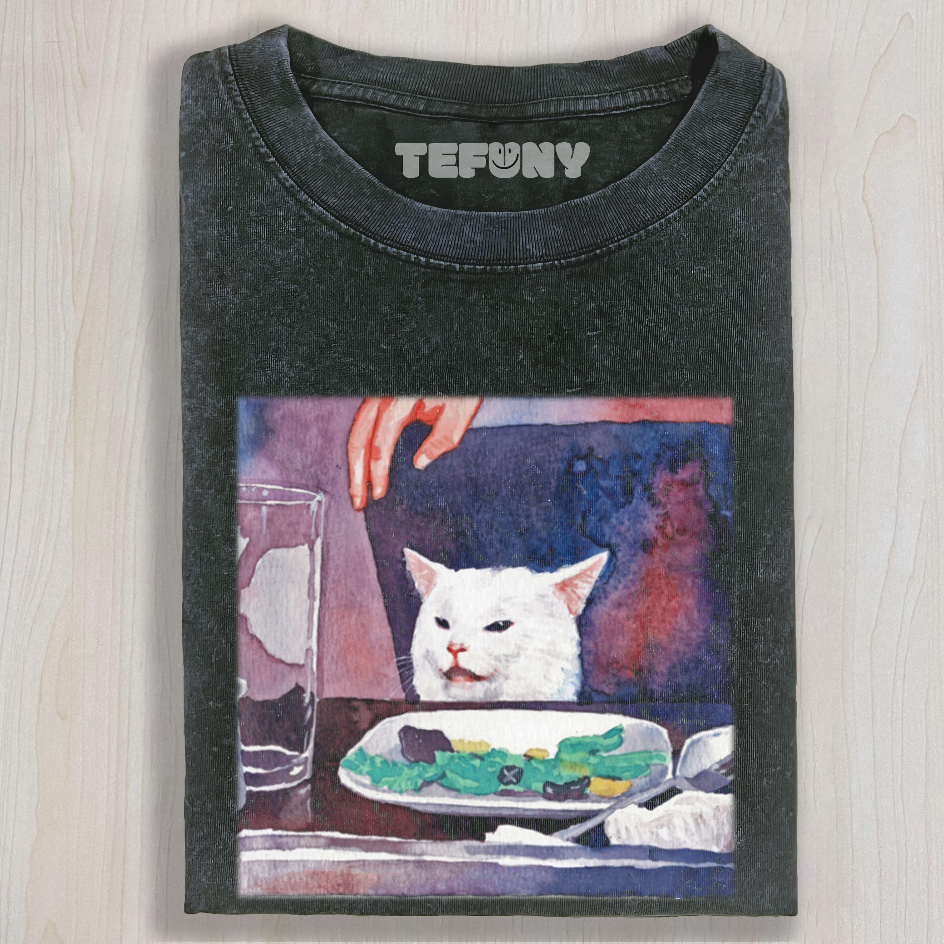 FUNNY CAT ON THE TABLE T-SHIRT