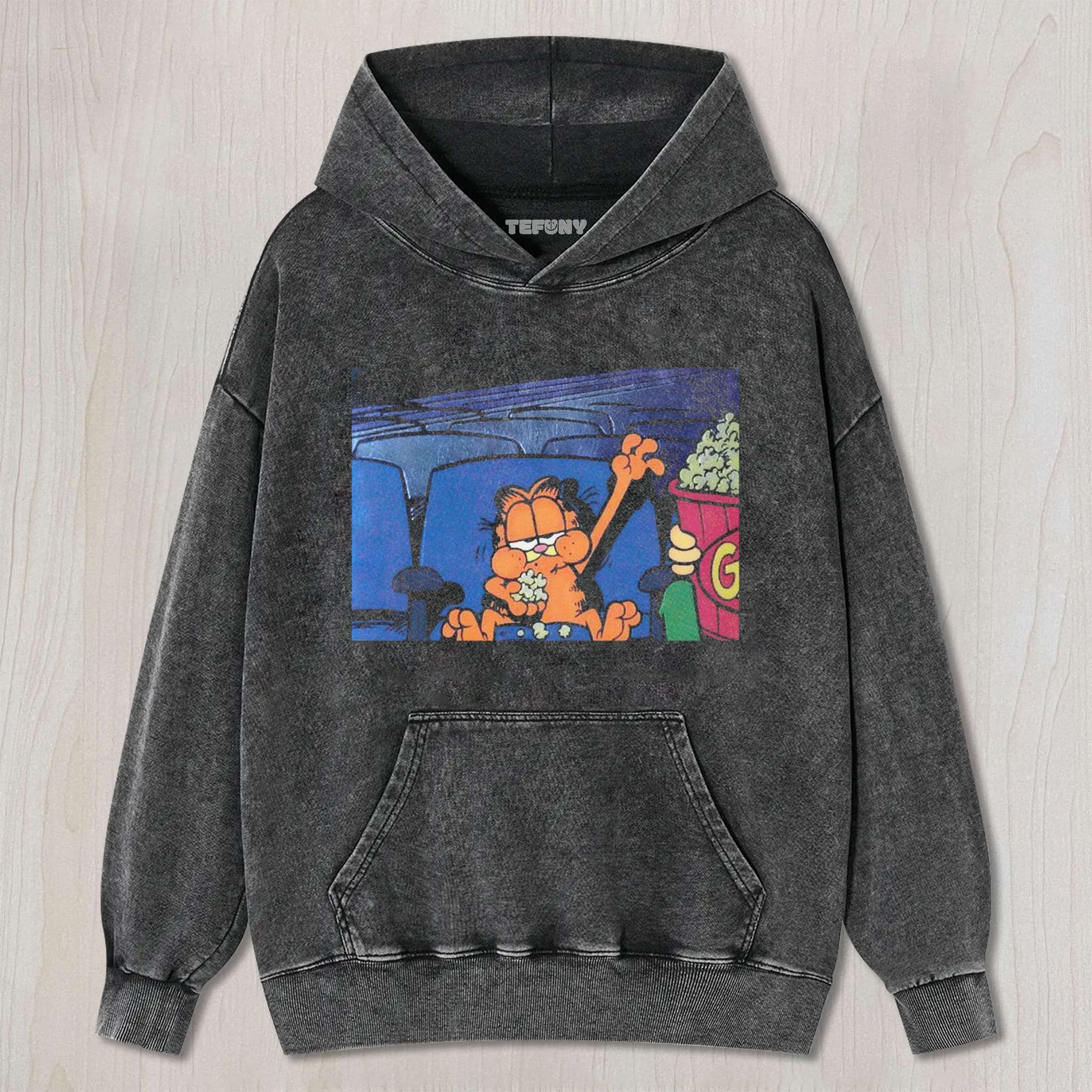 GARFIELD AT THE CINEMA UNISEX TEE, TANK TOP, LAYERED LS, SWEATSHIRT & HOODIE