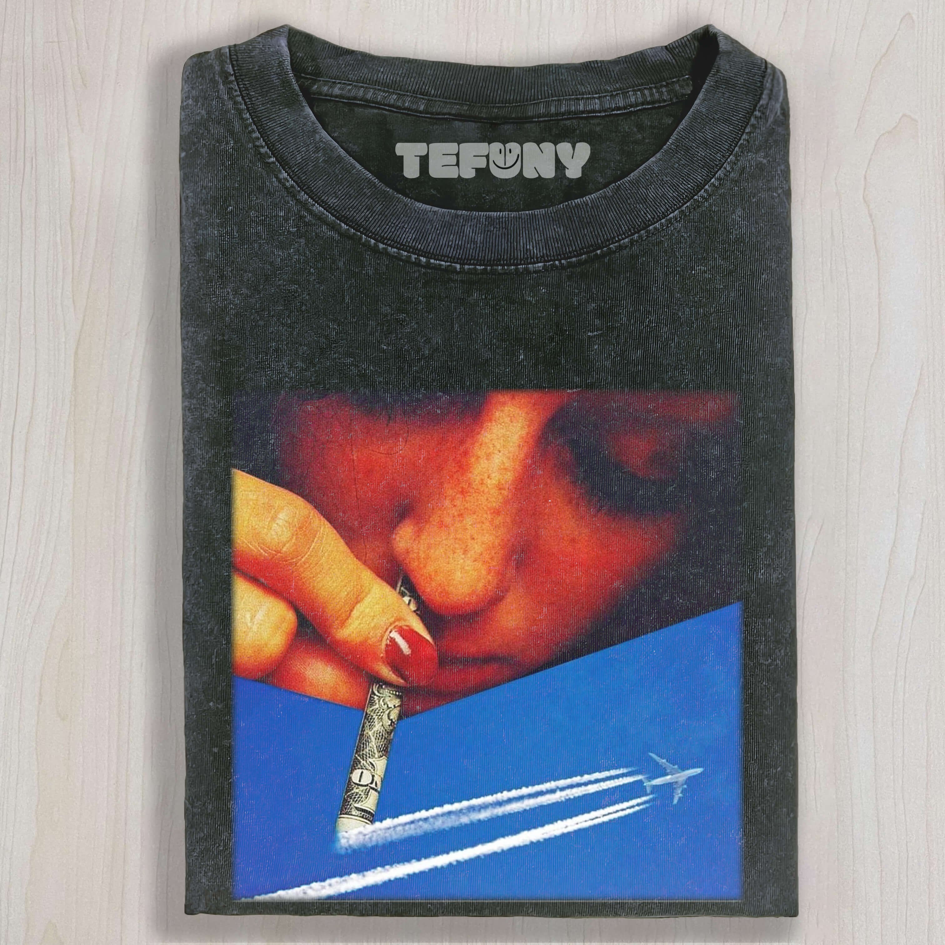 GIRL SNIFFING A JET TRAIL OF AN AIRPLANE TEE & SWEAT & HOOD