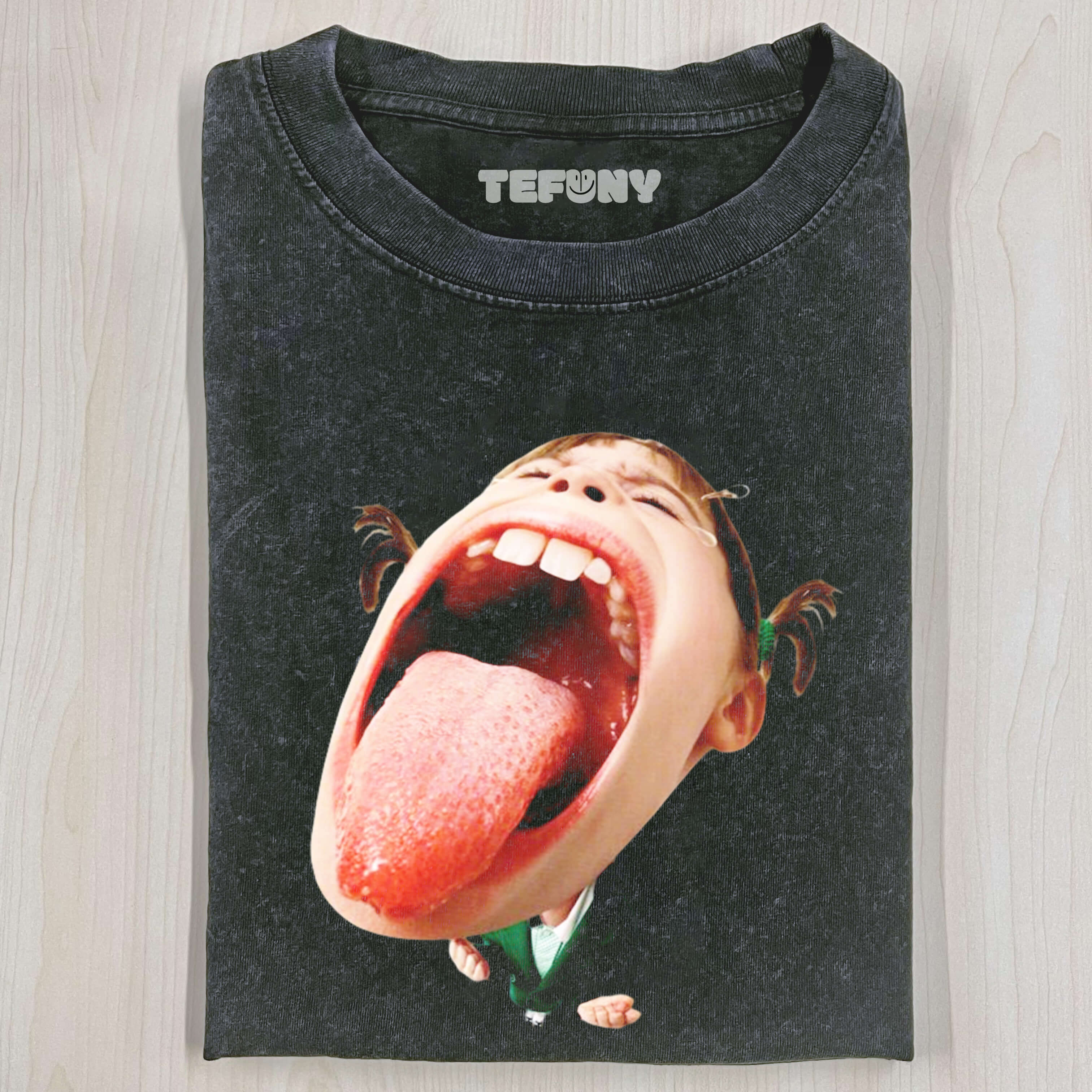 GIRL WITH BIG FACE AND STICKING OUT TONGUE T-SHIRT