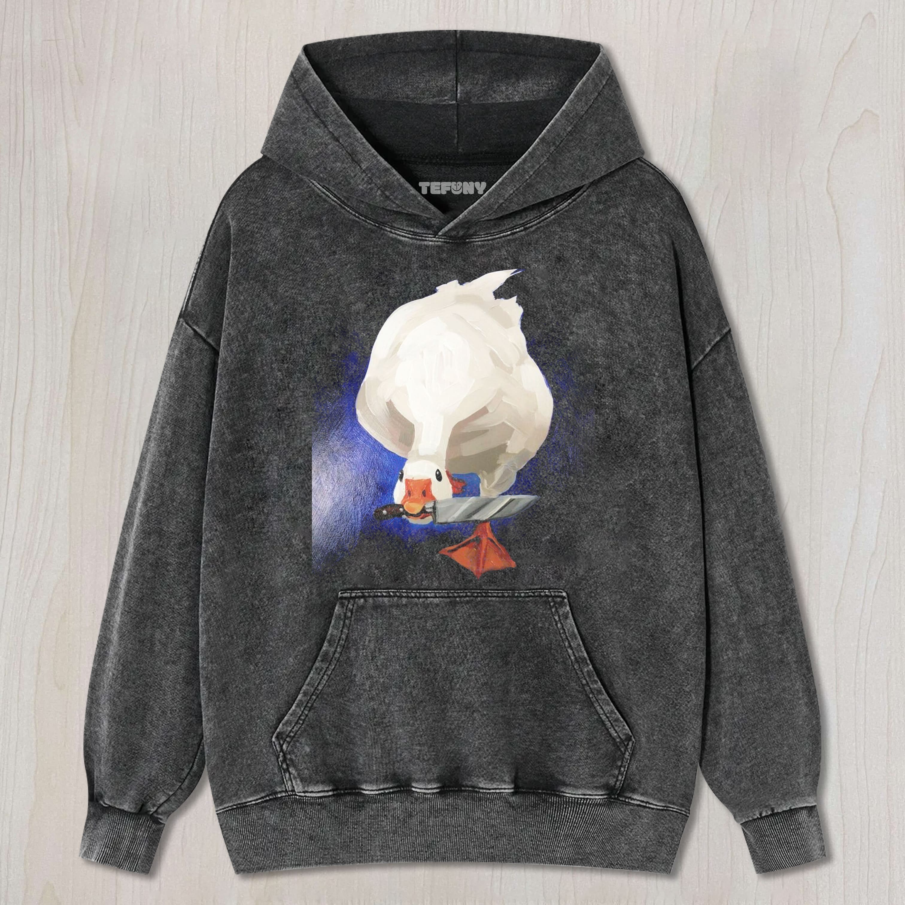 GOOSE HOLDING A KNIFE UNISEX TEE, TANK TOP, LAYERED LS, SWEATSHIRT & HOODIE
