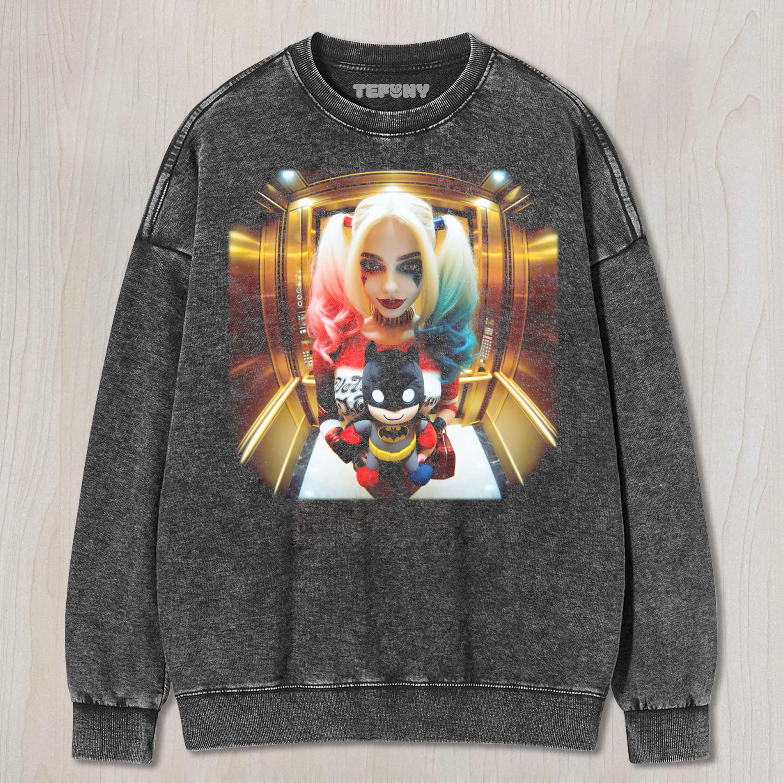 HARLEY QUINN HOLDING A BATMAN DOLL TEE & SWEAT & HOOD