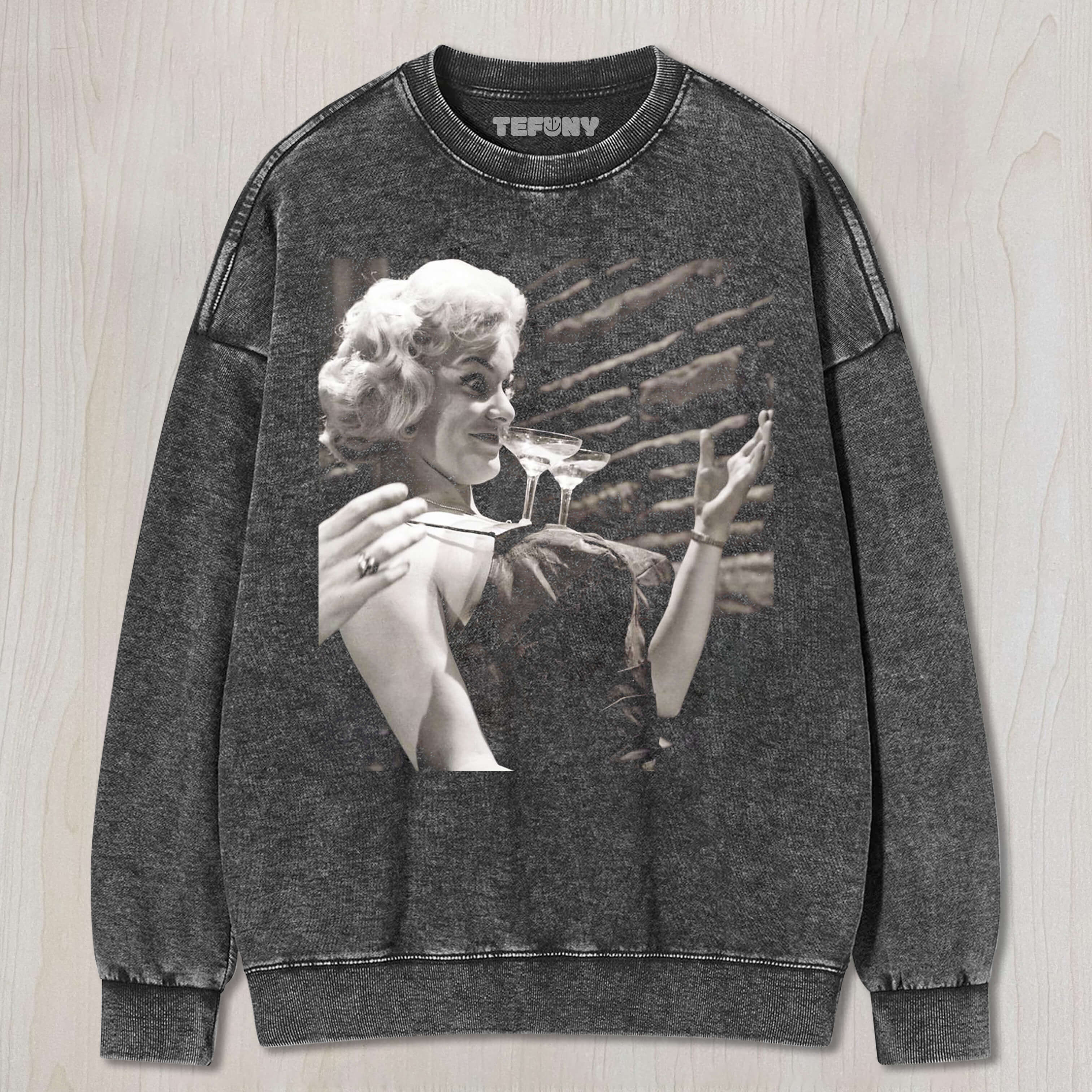 JOAN WILKINSON HAD TWO GLASSES OF WINE ON HER CHEST T-SHIRT