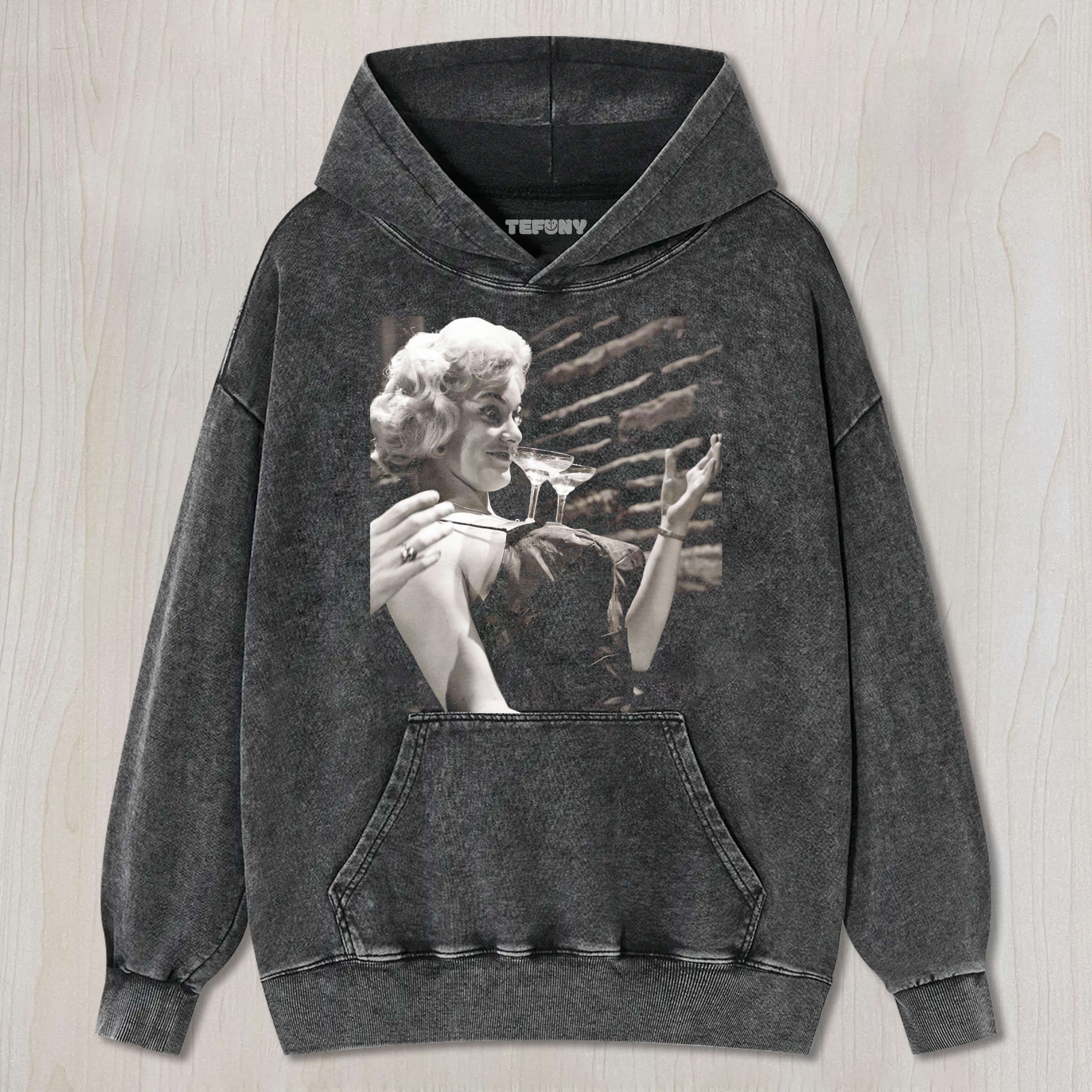 JOAN WILKINSON HAD TWO GLASSES OF WINE ON HER CHEST T-SHIRT