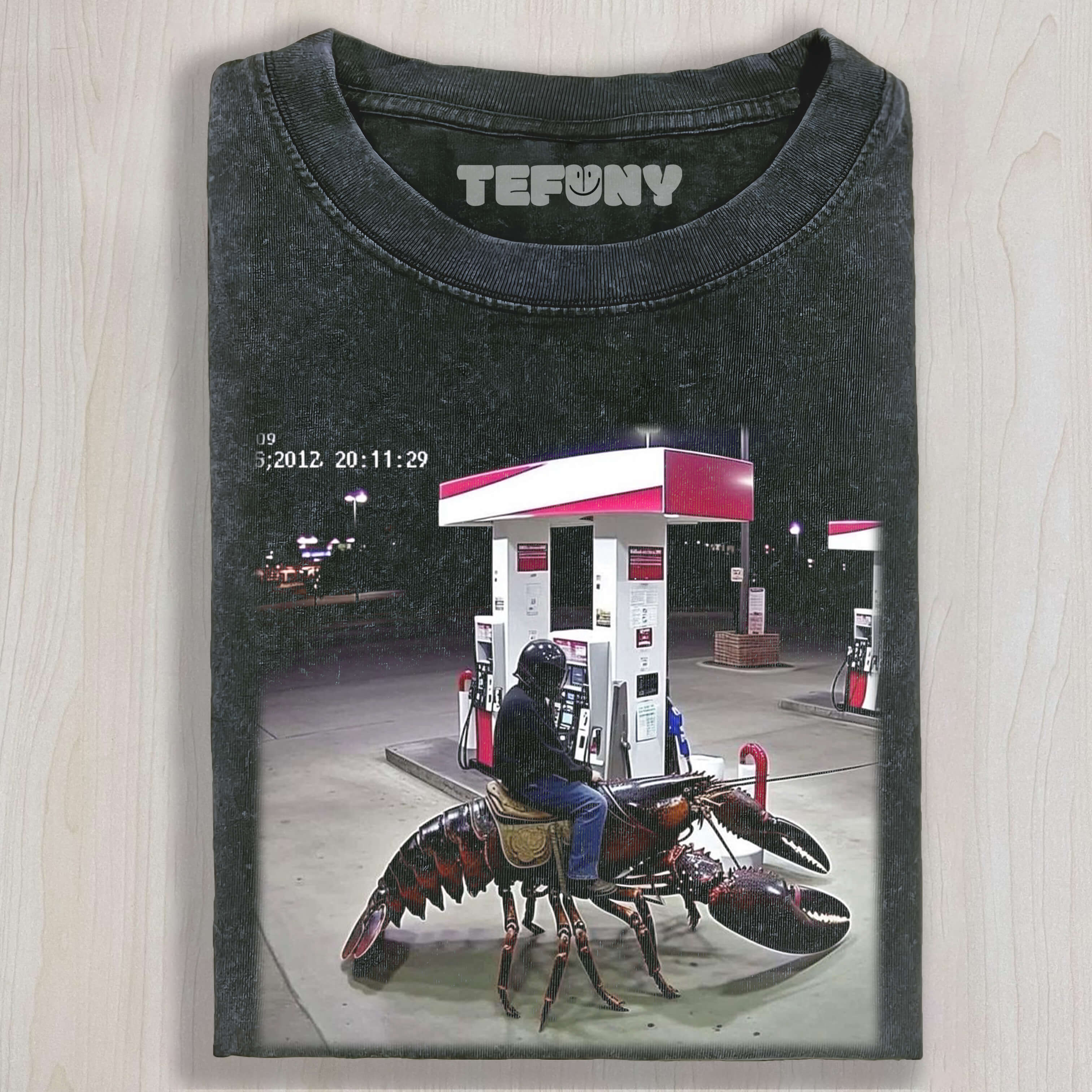 RIDING A GIANT SHRIMP T-SHIRT