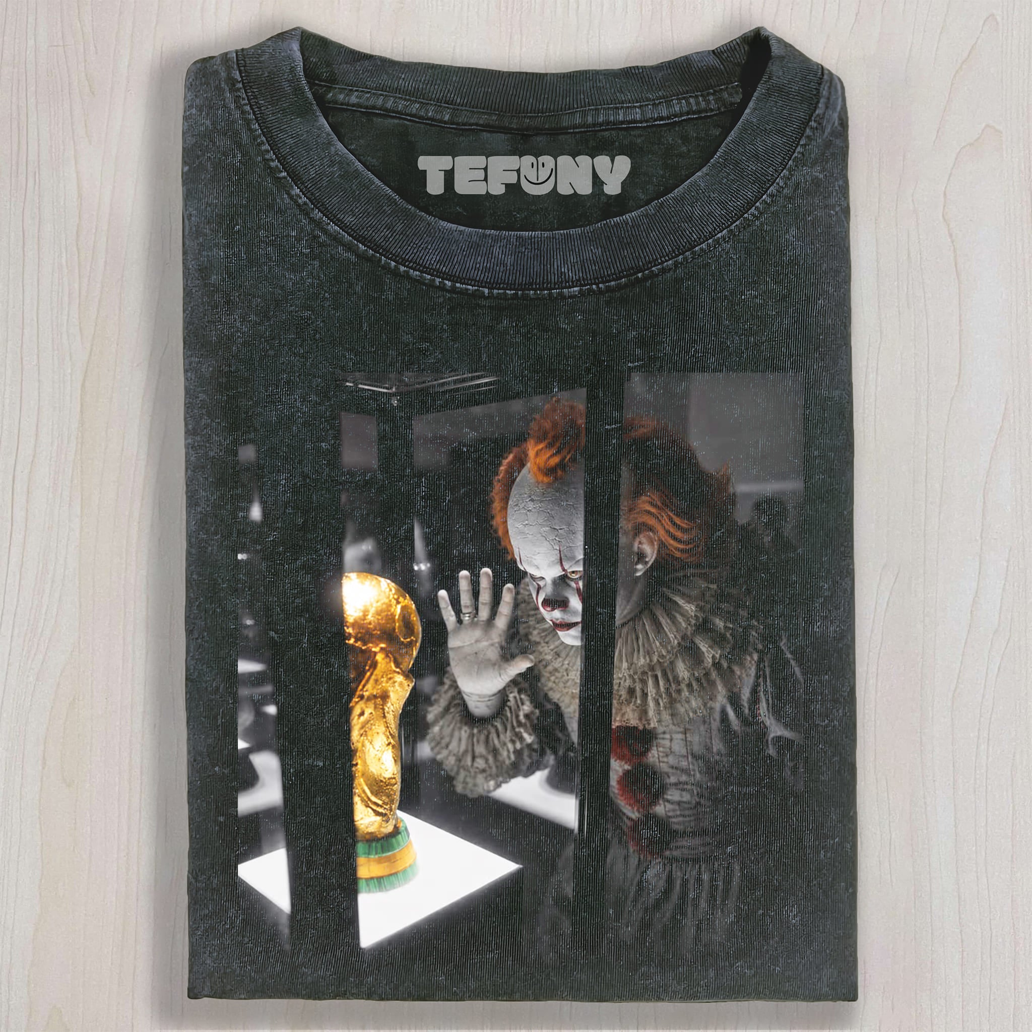 THE JOKER WANTS THE WORLD CUP TROPHY UNISEX TEE, TANK TOP, LAYERED LS, SWEATSHIRT & HOODIE