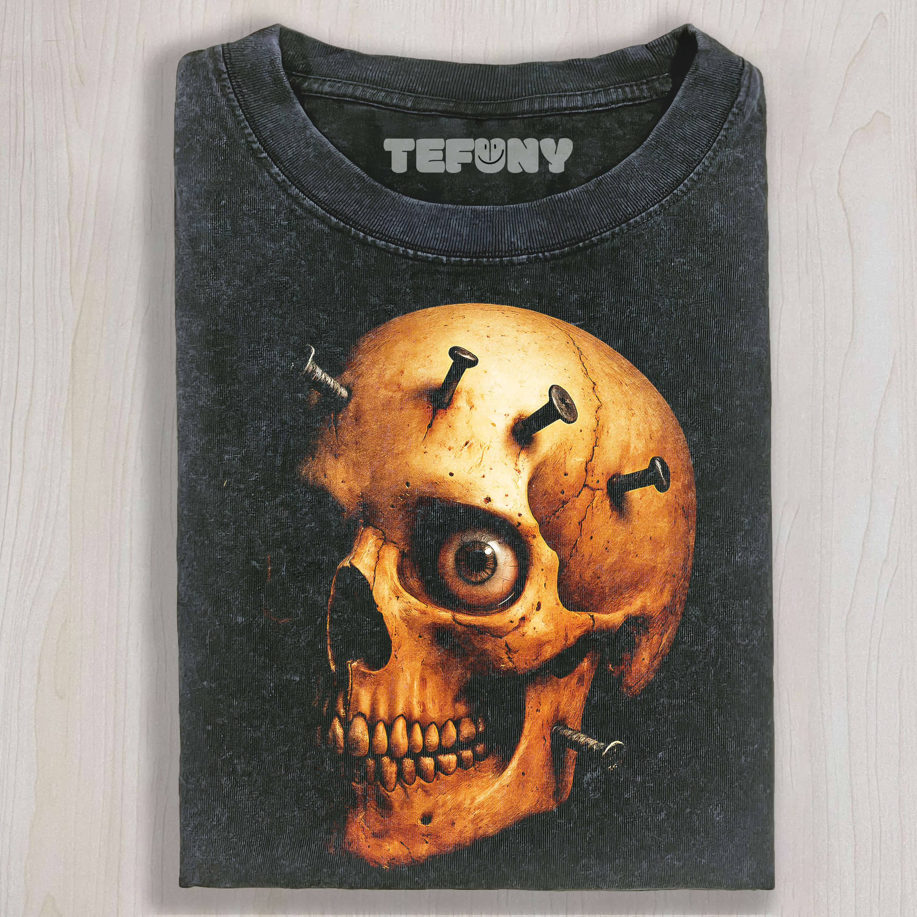 THERE ARE NAILS ON THE SKULL T-SHIRT