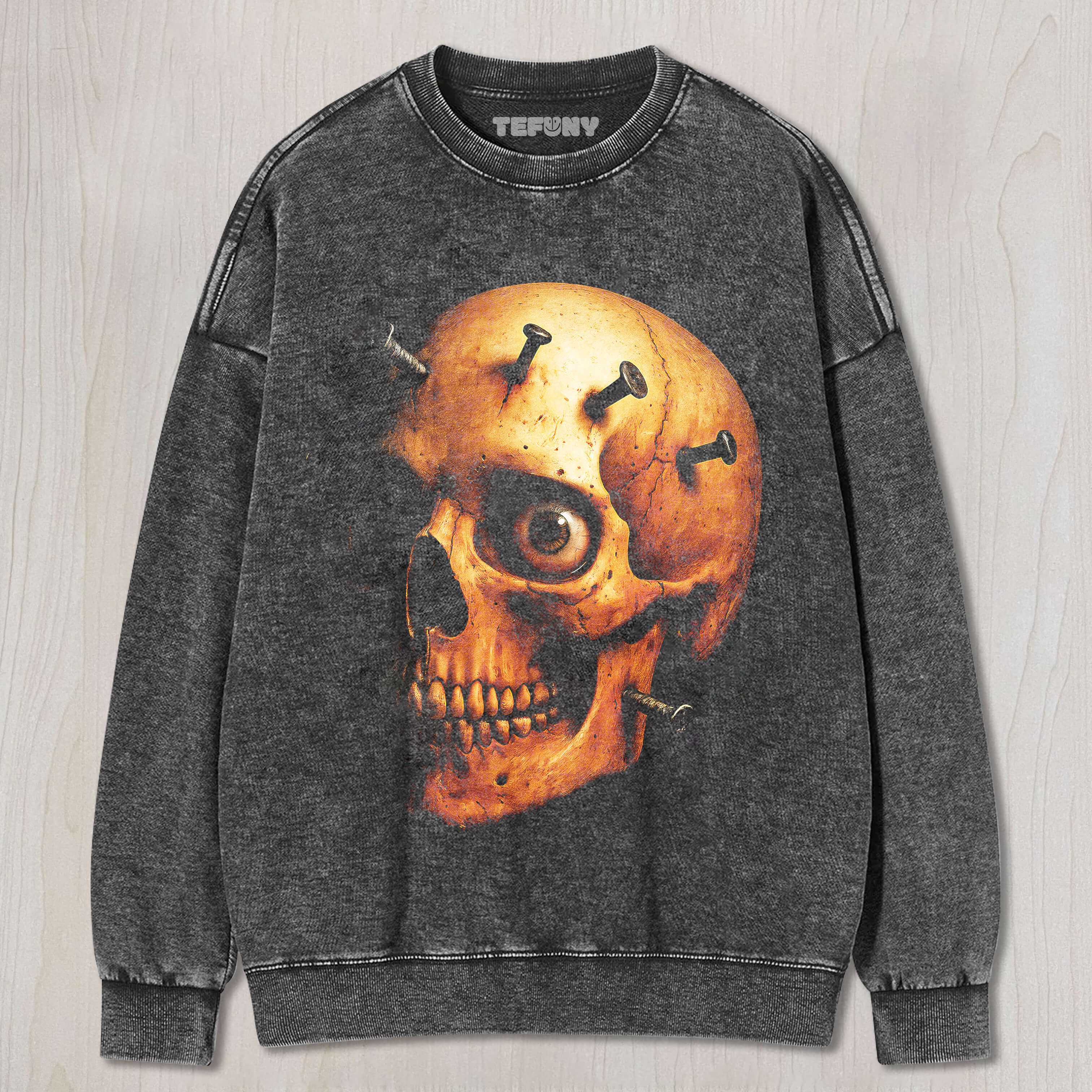 THERE ARE NAILS ON THE SKULL T-SHIRT