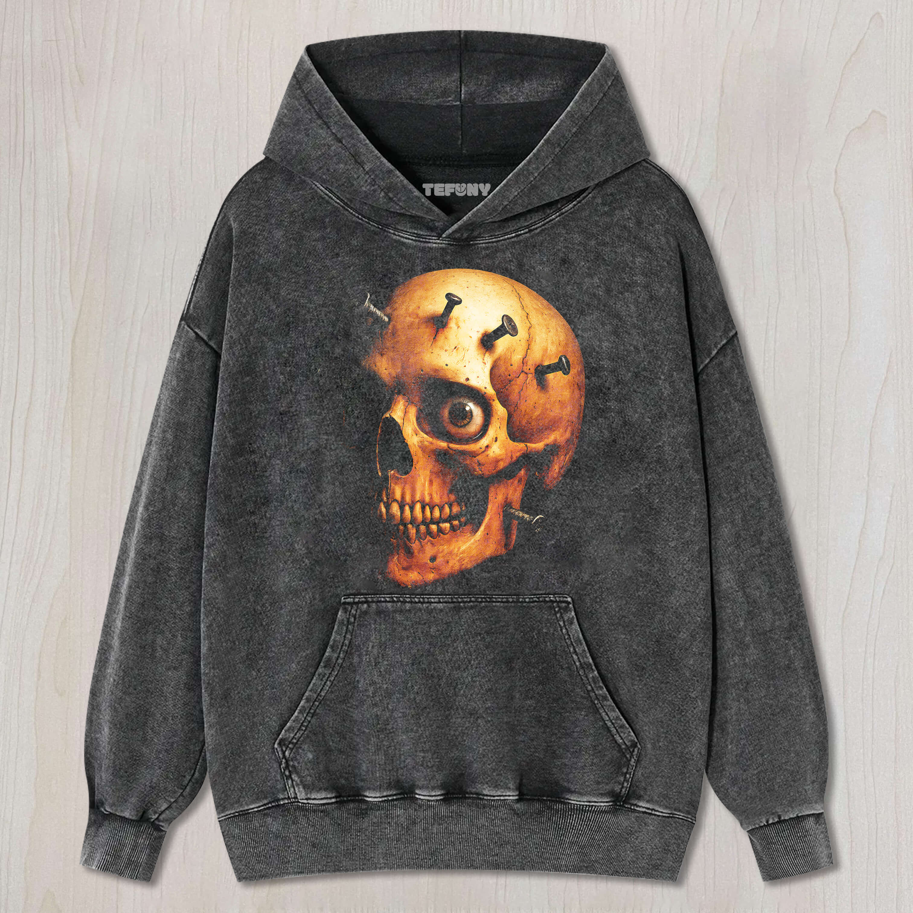 THERE ARE NAILS ON THE SKULL T-SHIRT