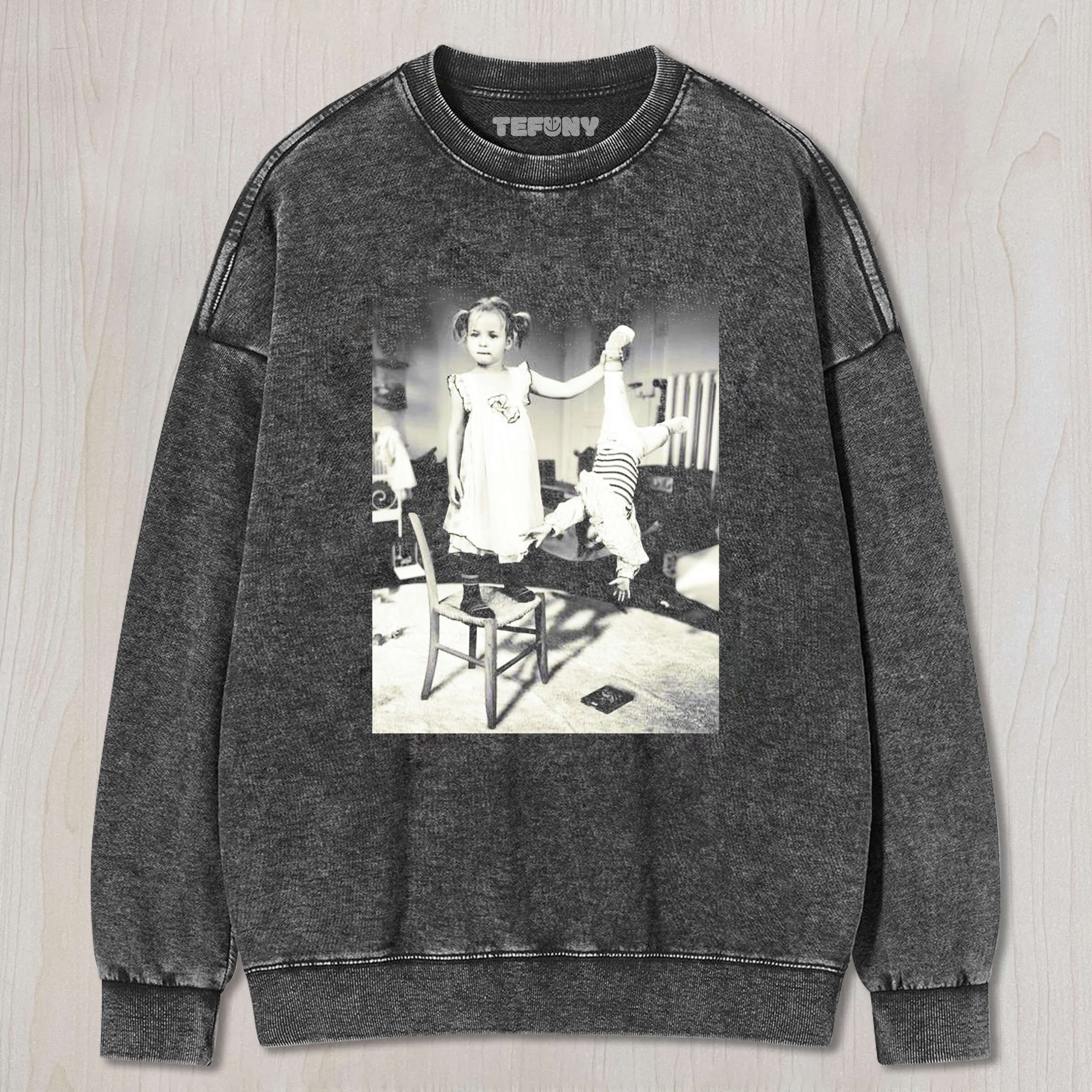 THE CHILD WAS HOLDING ONTO ANOTHER CHILD'S FOOT T-SHIRT & LONG SLEEVES & HOODIES