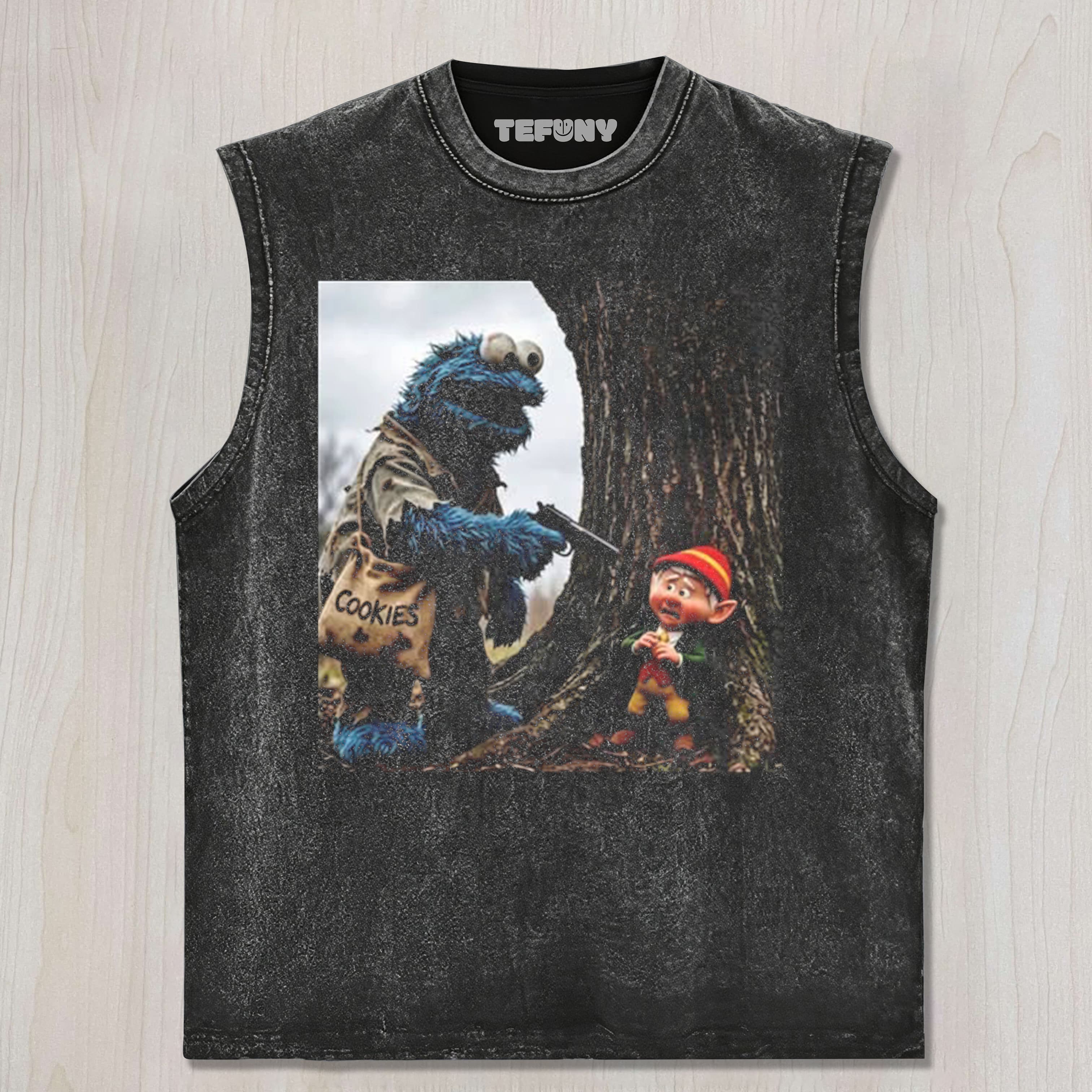 THE COOKIE MONSTER POINTS A GUN AT THE ELF UNISEX TEE, TANK TOP, LAYERED LS, SWEATSHIRT & HOODIE