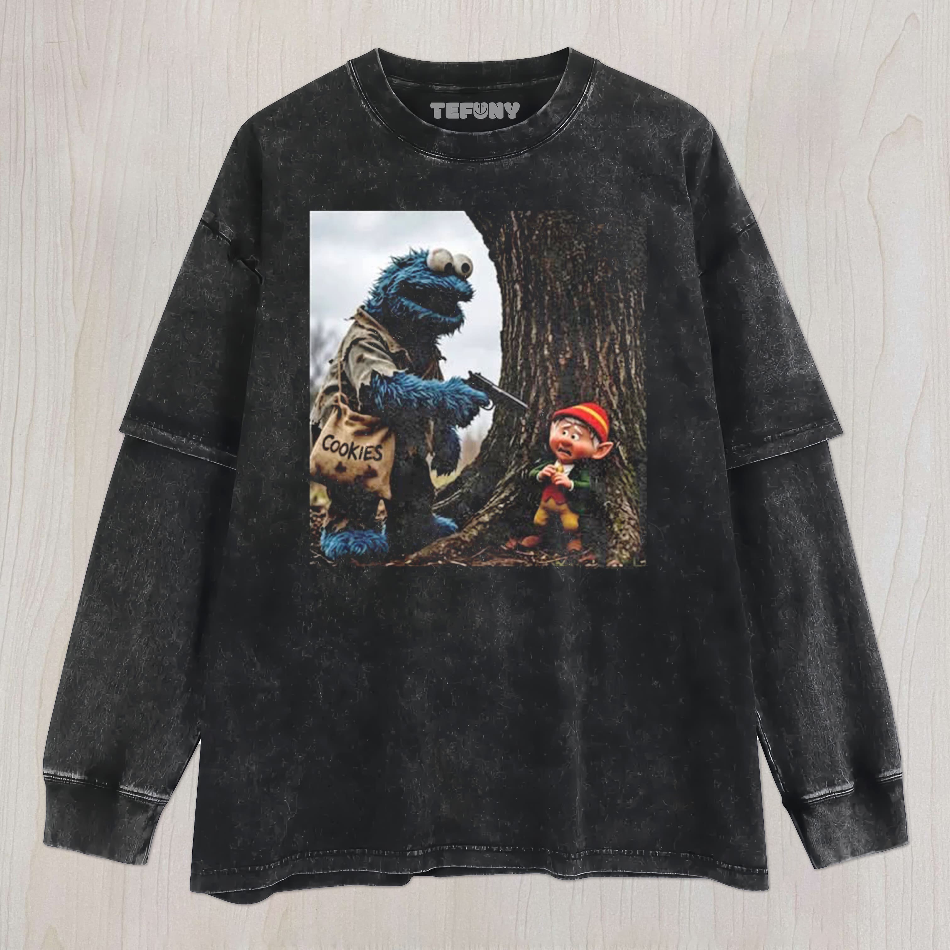 THE COOKIE MONSTER POINTS A GUN AT THE ELF UNISEX TEE, TANK TOP, LAYERED LS, SWEATSHIRT & HOODIE