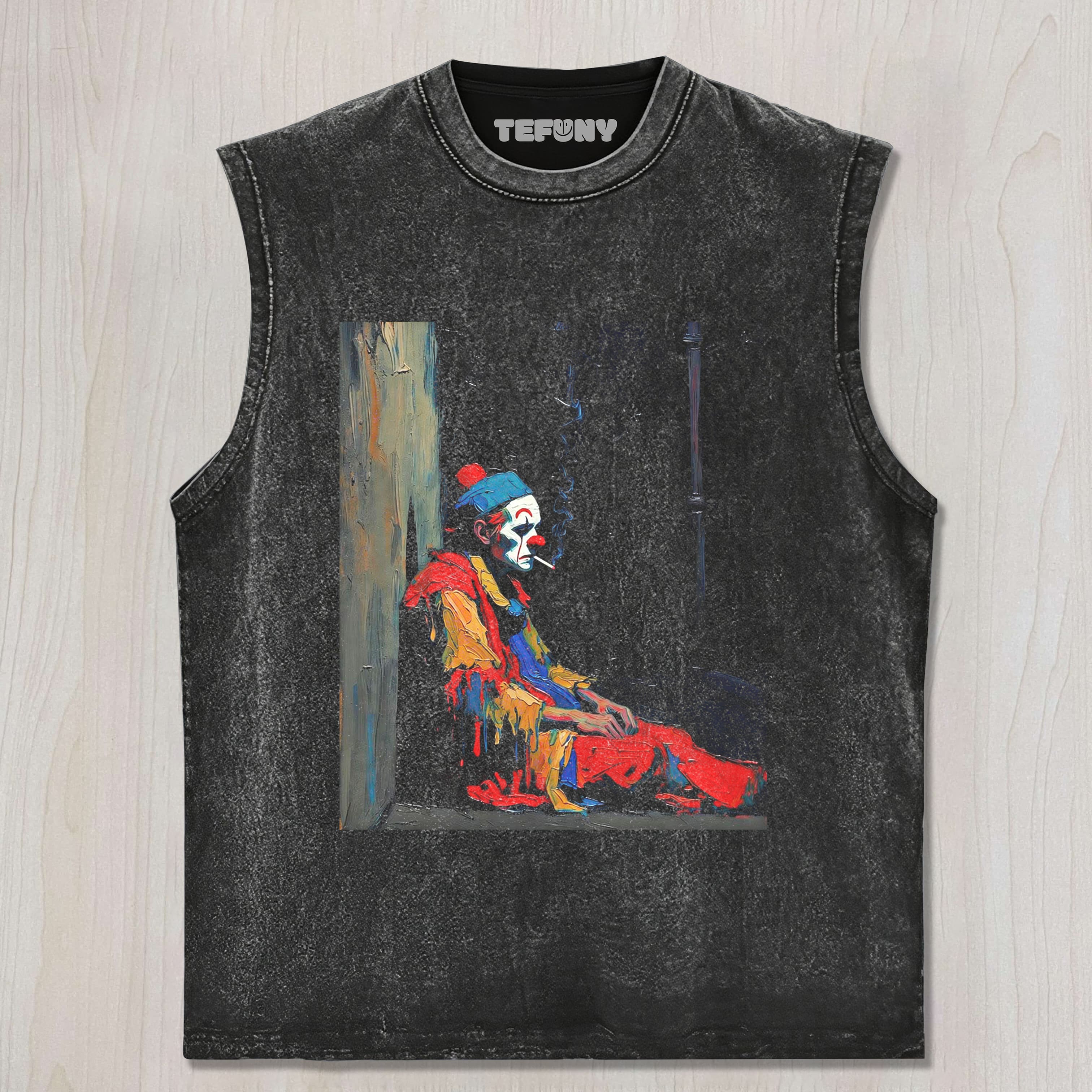 THE MELANCHOLY CLOWN IS SMOKING UNISEX TEE, TANK TOP, LAYERED LS, SWEATSHIRT & HOODIE