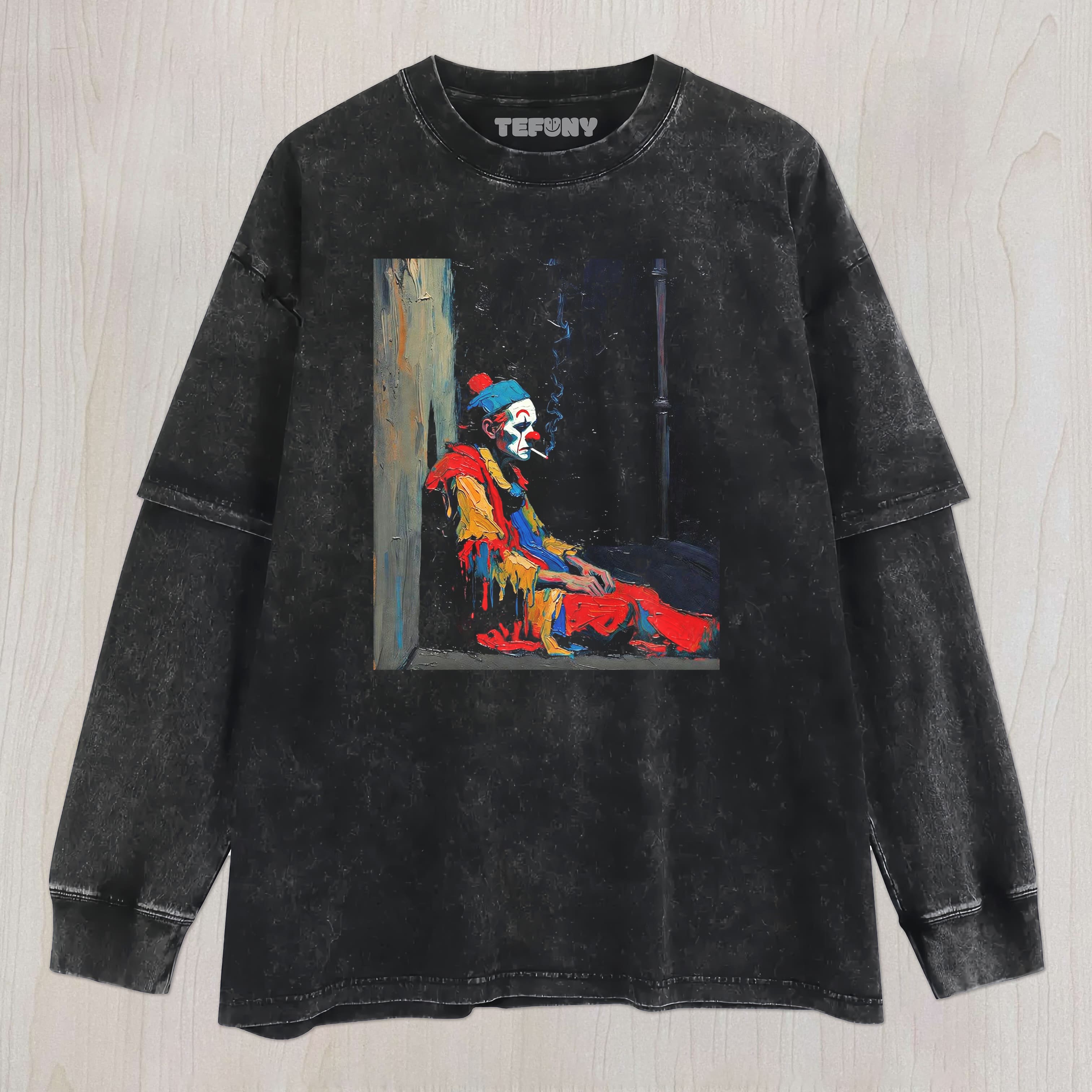 THE MELANCHOLY CLOWN IS SMOKING UNISEX TEE, TANK TOP, LAYERED LS, SWEATSHIRT & HOODIE