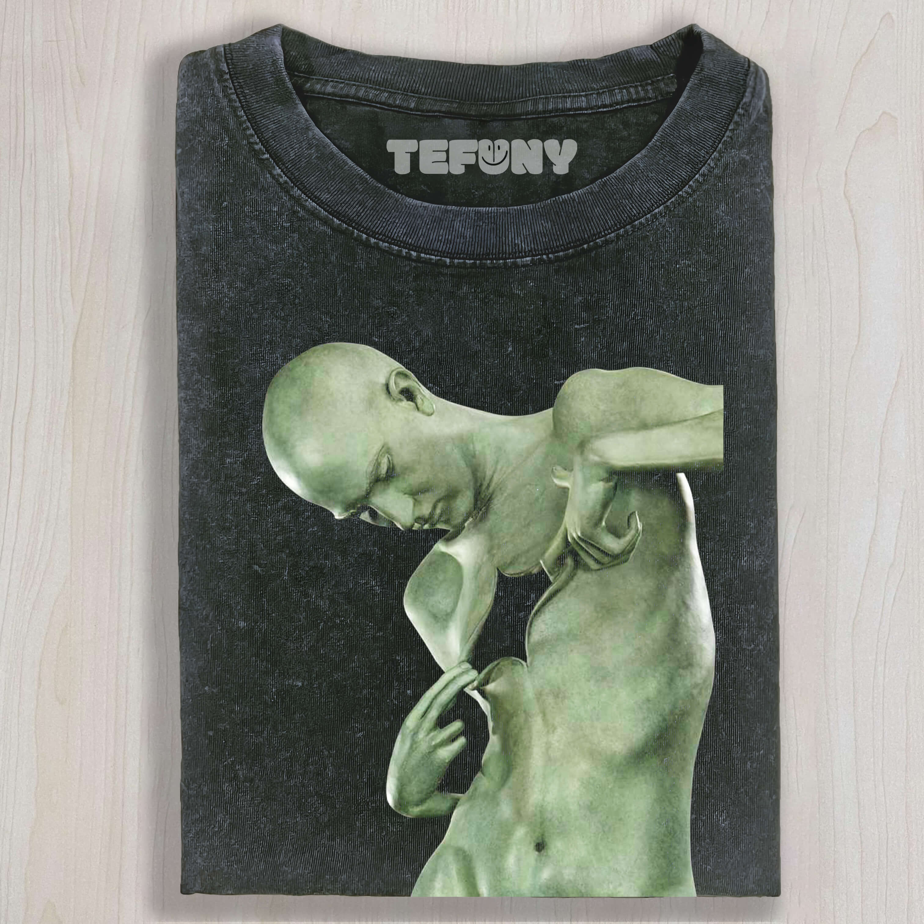 THE SCULPTURE HAS ITS CHEST TORN OPEN T-SHIRT & LONG SLEEVES & HOODIES